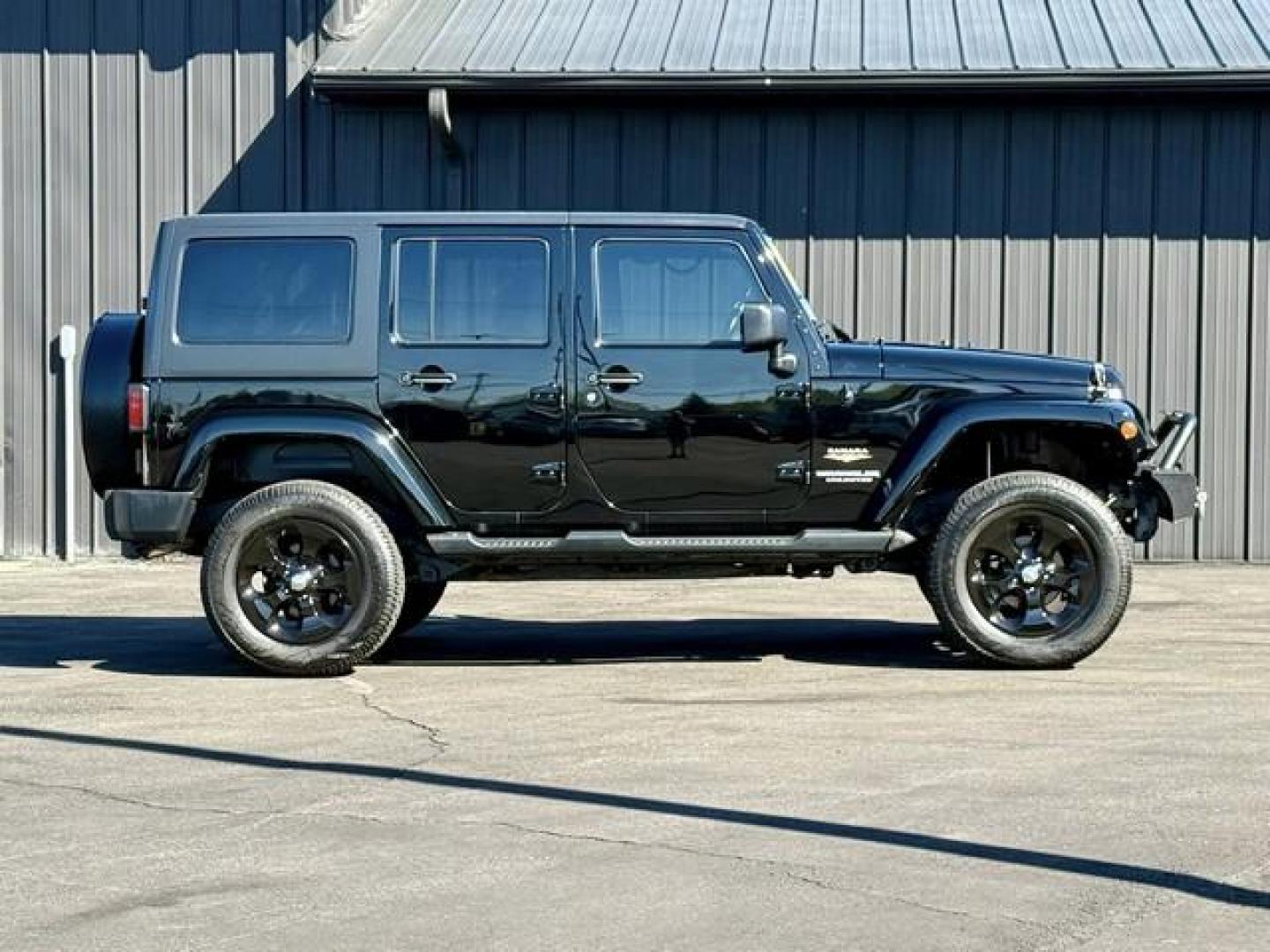 2014 BLACK JEEP WRANGLER (1C4BJWEG7EL) with an V6,3.6L(220 CID),DOHC engine, AUTOMATIC transmission, located at 14600 Frazho Road, Warren, MI, 48089, (586) 776-3400, 42.485996, -82.974220 - Photo#4