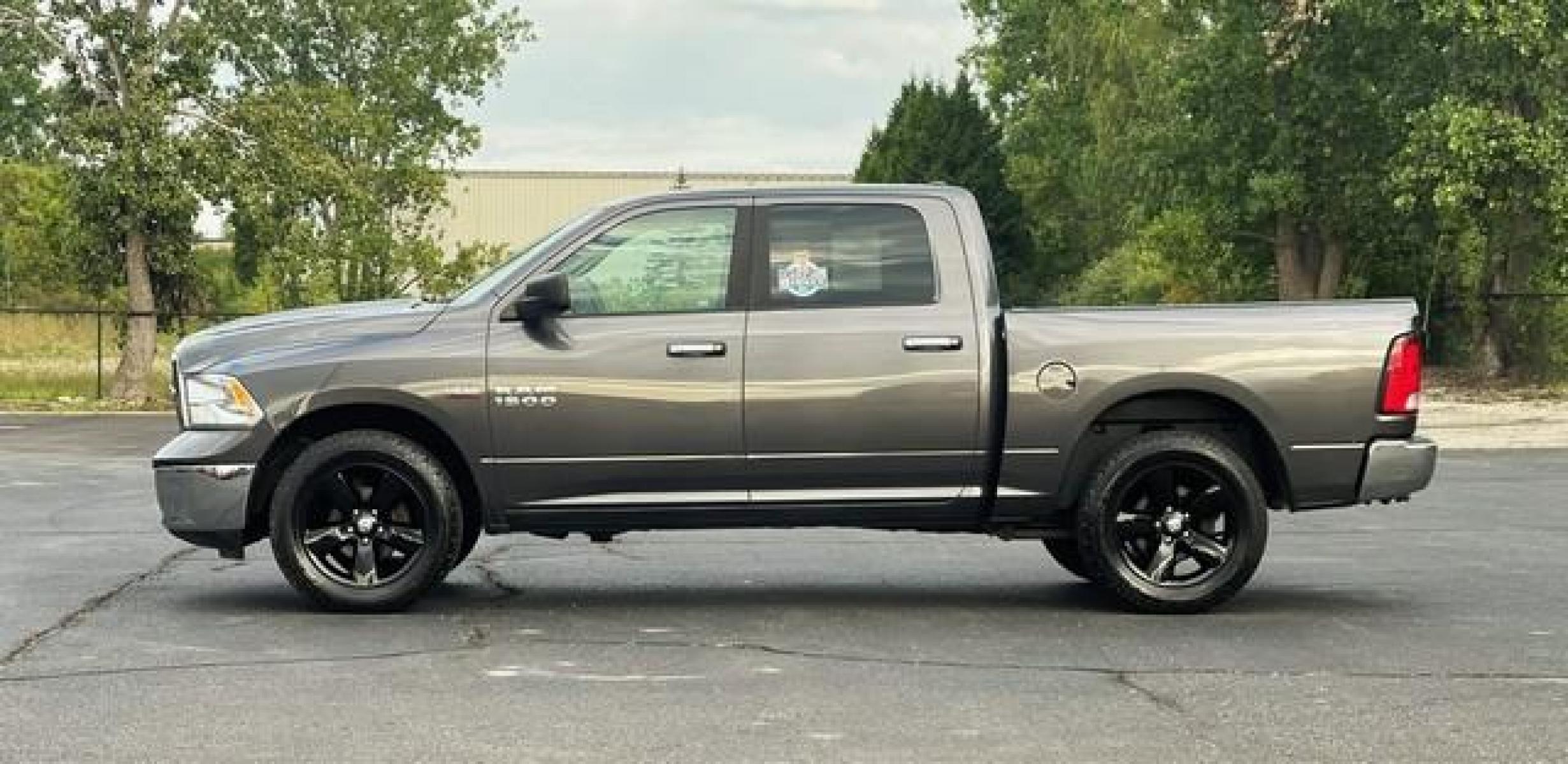 2016 GREY RAM 1500 (1C6RR7LT5GS) with an V8,5.7L(345 CID),OHV engine, AUTOMATIC transmission, located at 14600 Frazho Road, Warren, MI, 48089, (586) 776-3400, 42.485996, -82.974220 - Photo #0