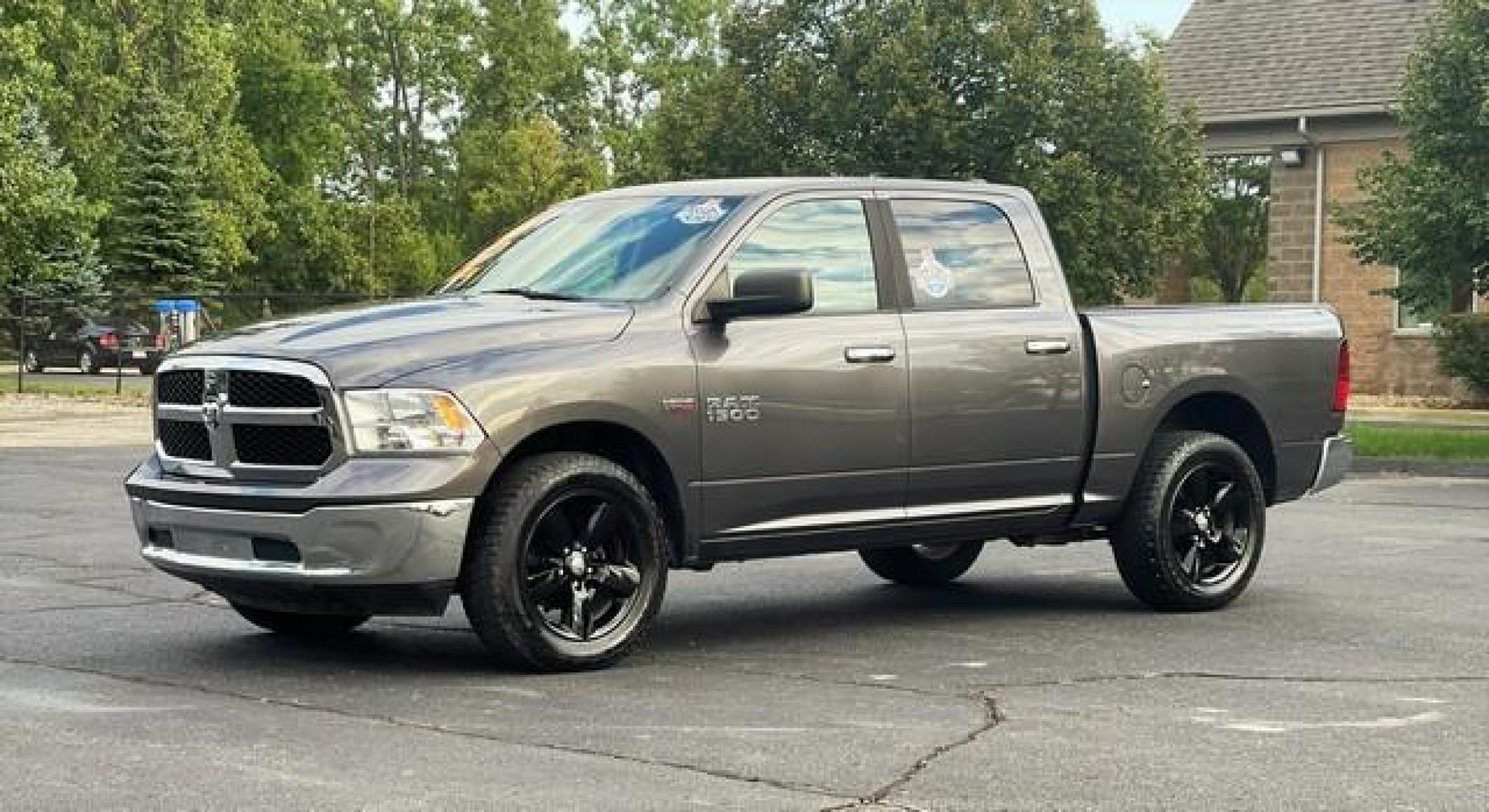 2016 GREY RAM 1500 (1C6RR7LT5GS) with an V8,5.7L(345 CID),OHV engine, AUTOMATIC transmission, located at 14600 Frazho Road, Warren, MI, 48089, (586) 776-3400, 42.485996, -82.974220 - Photo #3