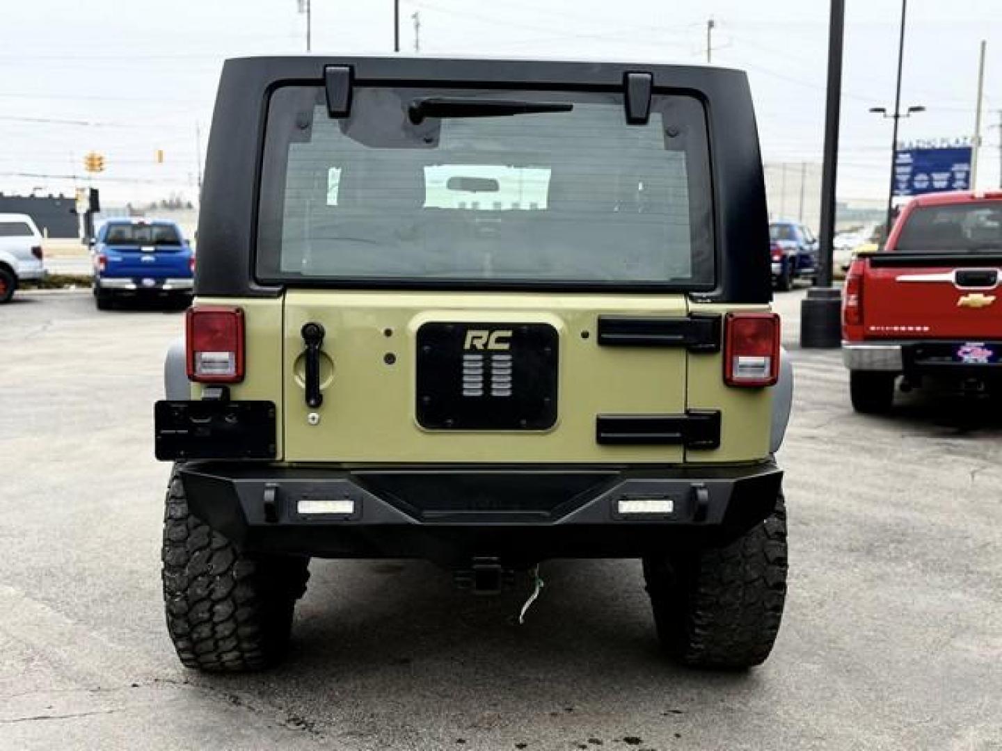 2013 GREEN JEEP WRANGLER (1C4AJWAG2DL) with an V6,3.6L(220 CID),DOHC engine, AUTOMATIC transmission, located at 14600 Frazho Road, Warren, MI, 48089, (586) 776-3400, 42.485996, -82.974220 - Photo#6