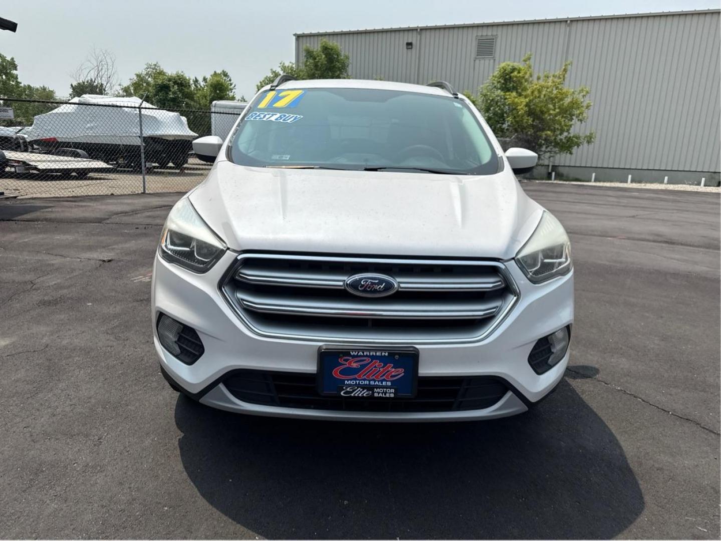 2017 WHITE FORD ESCAPE (1FMCU9GDXHU) with an L4,1.5L(91 CID),DOHC engine, AUTOMATIC transmission, located at 14600 Frazho Road, Warren, MI, 48089, (586) 776-3400, 42.485996, -82.974220 - Photo#1