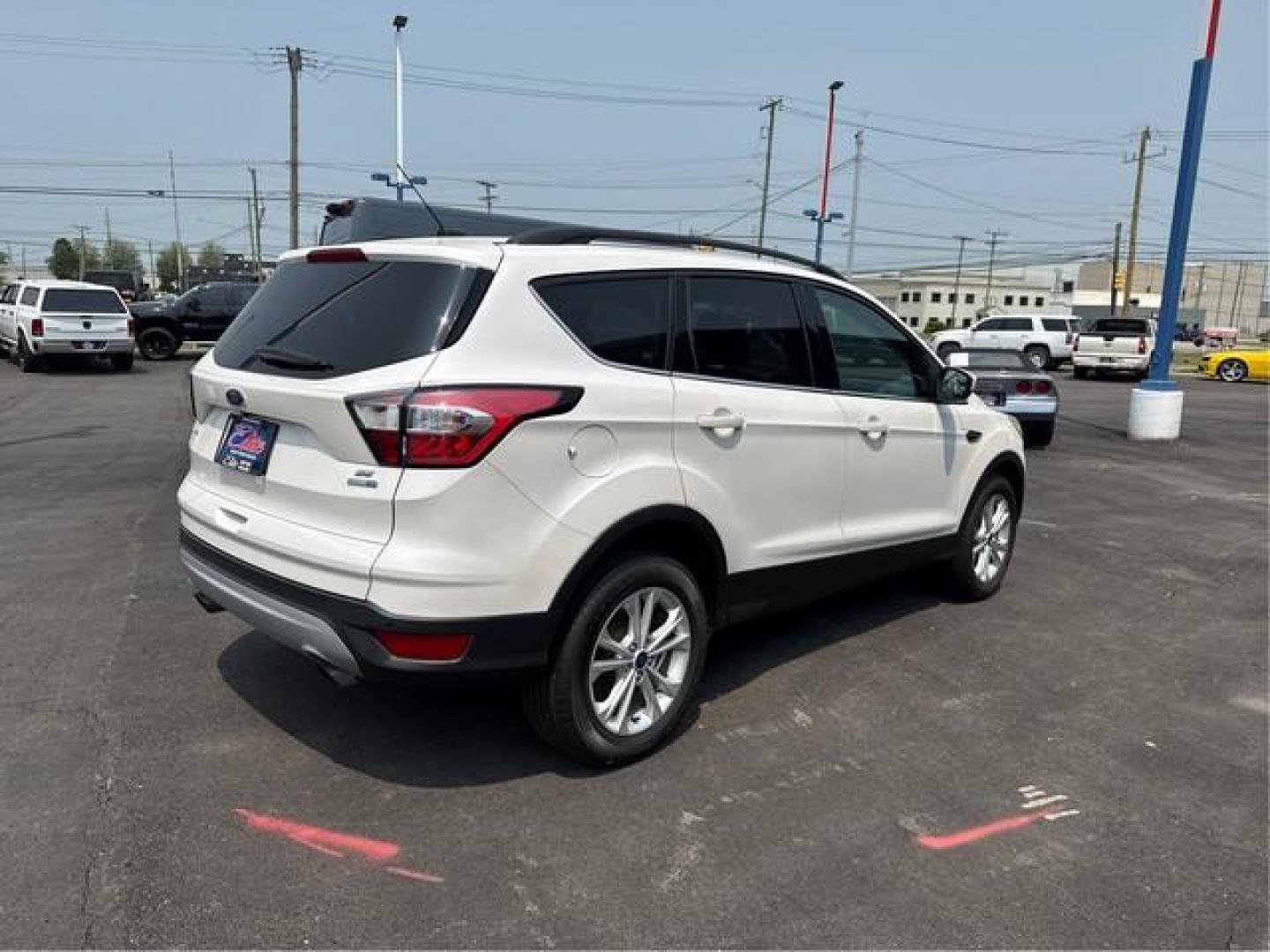 2017 WHITE FORD ESCAPE (1FMCU9GDXHU) with an L4,1.5L(91 CID),DOHC engine, AUTOMATIC transmission, located at 14600 Frazho Road, Warren, MI, 48089, (586) 776-3400, 42.485996, -82.974220 - Photo#5