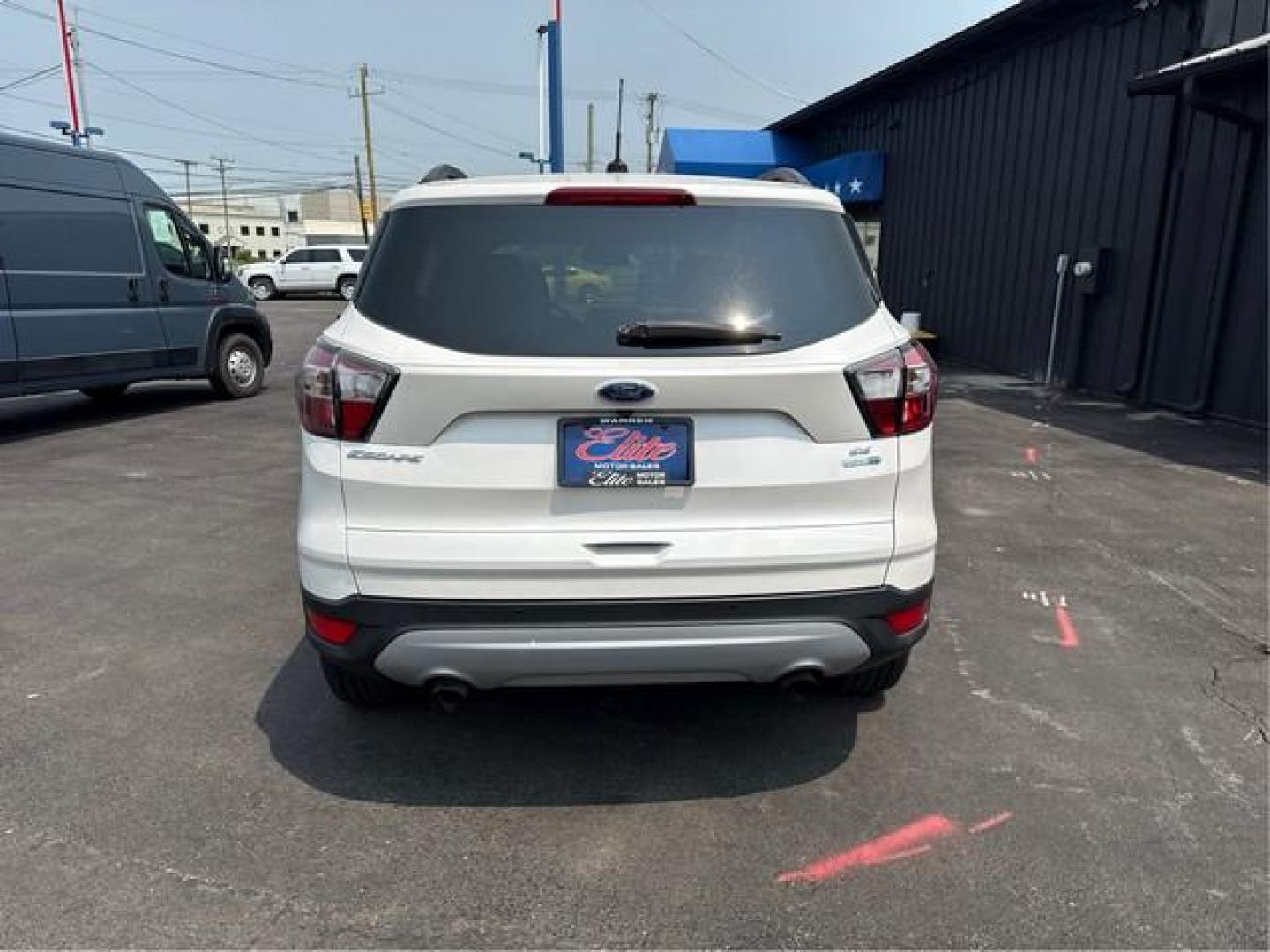 2017 WHITE FORD ESCAPE (1FMCU9GDXHU) with an L4,1.5L(91 CID),DOHC engine, AUTOMATIC transmission, located at 14600 Frazho Road, Warren, MI, 48089, (586) 776-3400, 42.485996, -82.974220 - Photo#6