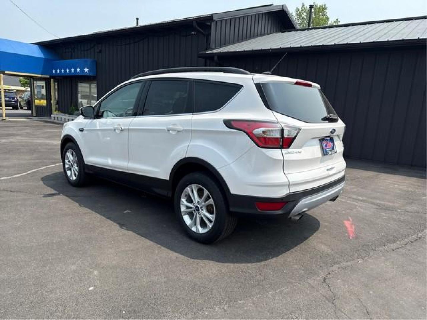 2017 WHITE FORD ESCAPE (1FMCU9GDXHU) with an L4,1.5L(91 CID),DOHC engine, AUTOMATIC transmission, located at 14600 Frazho Road, Warren, MI, 48089, (586) 776-3400, 42.485996, -82.974220 - Photo#7