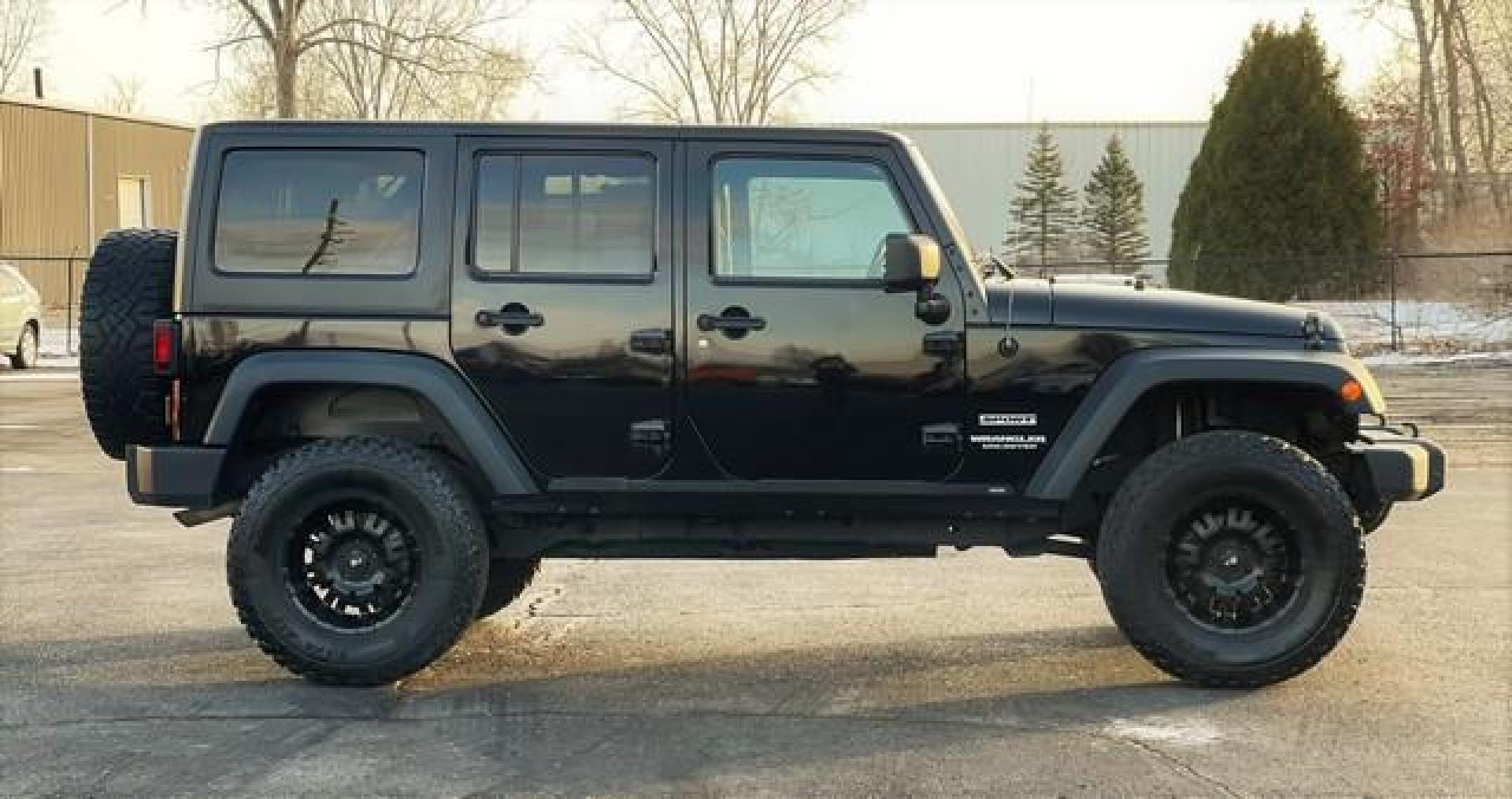 2014 BLACK JEEP WRANGLER (1C4BJWDG7EL) with an V6,3.6L(220 CID),DOHC engine, MANUAL transmission, located at 14600 Frazho Road, Warren, MI, 48089, (586) 776-3400, 42.485996, -82.974220 - Photo#4