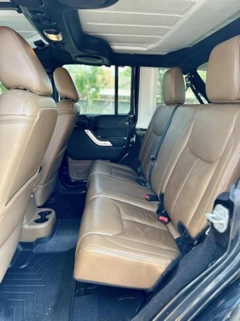 2013 BLACK JEEP WRANGLER SAHARA (1C4BJWEG6DL) with an V6,3.6L(220 CID),DOHC engine, AUTOMATIC transmission, located at 14600 Frazho Road, Warren, MI, 48089, (586) 776-3400, 42.485996, -82.974220 - Photo#22