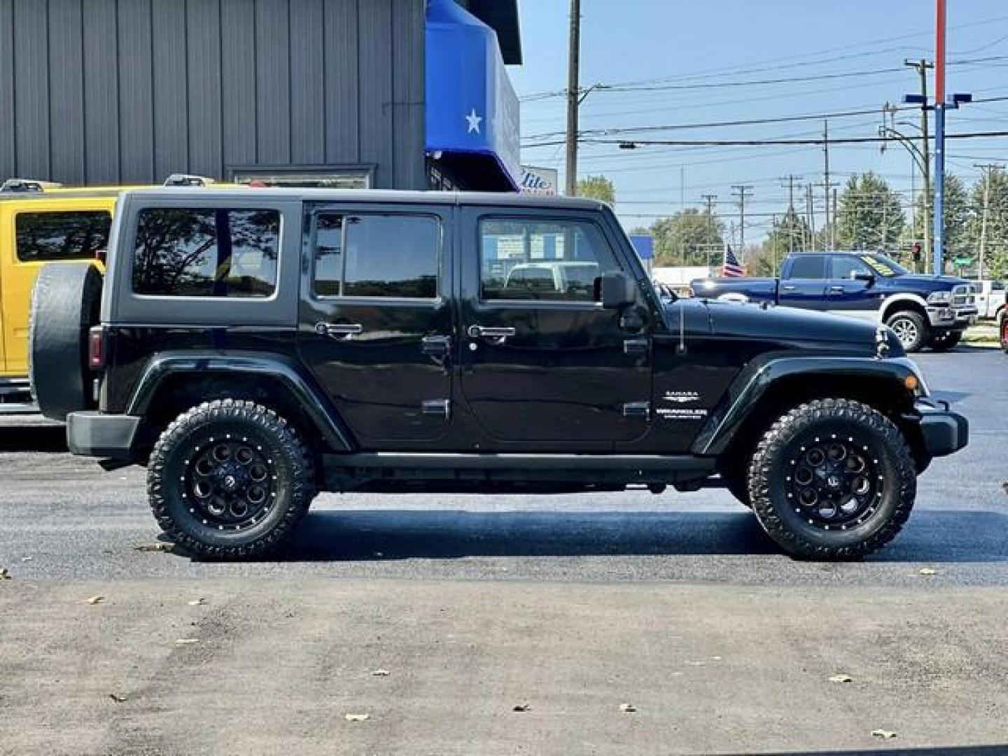 2013 BLACK JEEP WRANGLER SAHARA (1C4BJWEG6DL) with an V6,3.6L(220 CID),DOHC engine, AUTOMATIC transmission, located at 14600 Frazho Road, Warren, MI, 48089, (586) 776-3400, 42.485996, -82.974220 - Photo#3
