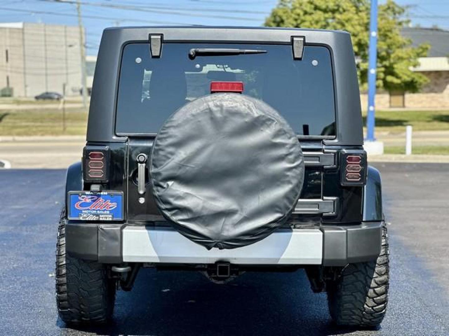 2013 BLACK JEEP WRANGLER SAHARA (1C4BJWEG6DL) with an V6,3.6L(220 CID),DOHC engine, AUTOMATIC transmission, located at 14600 Frazho Road, Warren, MI, 48089, (586) 776-3400, 42.485996, -82.974220 - Photo#5