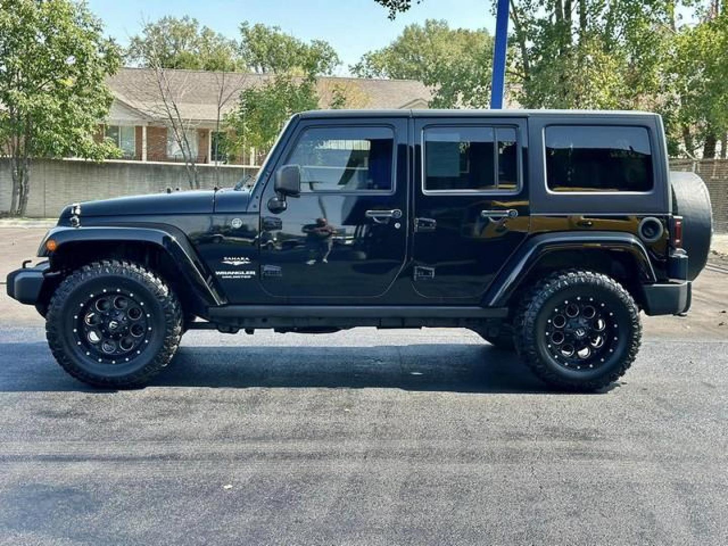 2013 BLACK JEEP WRANGLER SAHARA (1C4BJWEG6DL) with an V6,3.6L(220 CID),DOHC engine, AUTOMATIC transmission, located at 14600 Frazho Road, Warren, MI, 48089, (586) 776-3400, 42.485996, -82.974220 - Photo#7