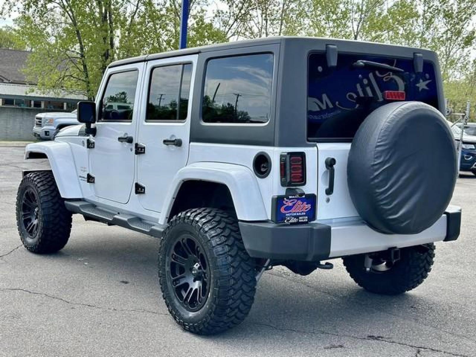 2015 WHITE JEEP WRANGLER (1C4BJWEG8FL) with an V6,3.6L(220 CID),DOHC engine, AUTOMATIC transmission, located at 14600 Frazho Road, Warren, MI, 48089, (586) 776-3400, 42.485996, -82.974220 - Photo #6