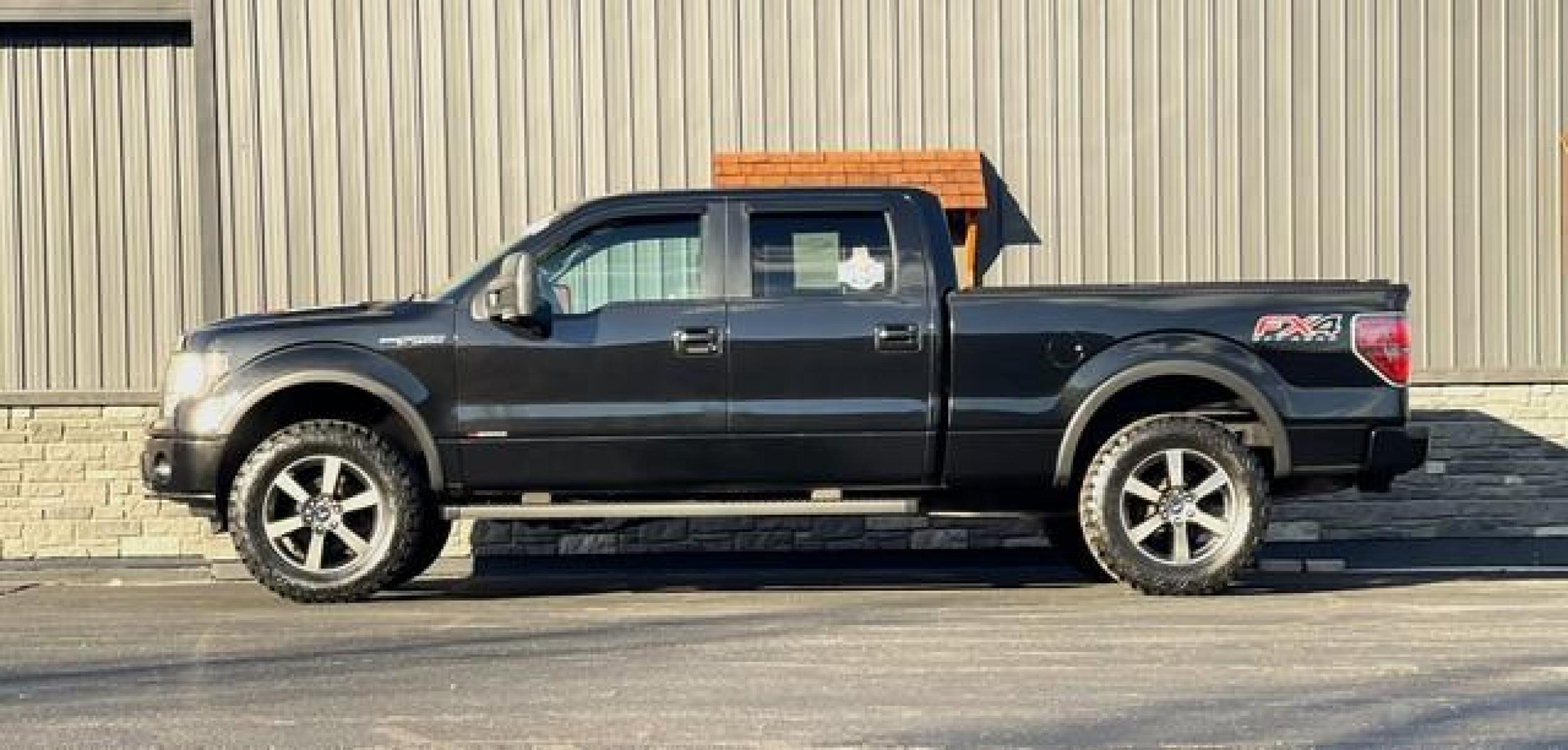2013 BLACK FORD F-150 (1FTFW1E63DF) with an V8,6.2L(379 CID),SOHC engine, AUTOMATIC transmission, located at 14600 Frazho Road, Warren, MI, 48089, (586) 776-3400, 42.485996, -82.974220 - Photo #2