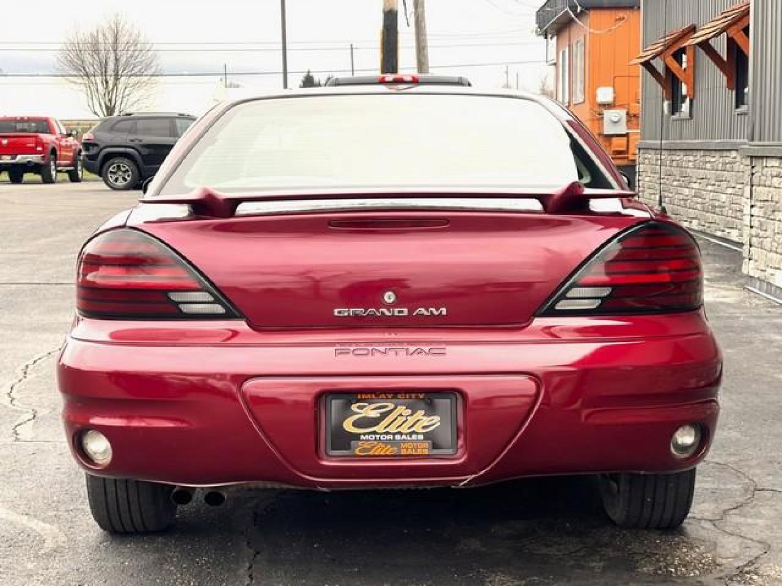 2004 BURGUNDY PONTIAC GRAND AM (1G2NE52F44C) with an L4,2.2L(134 CID),DOHC engine, AUTOMATIC transmission, located at 14600 Frazho Road, Warren, MI, 48089, (586) 776-3400, 42.485996, -82.974220 - Photo #6