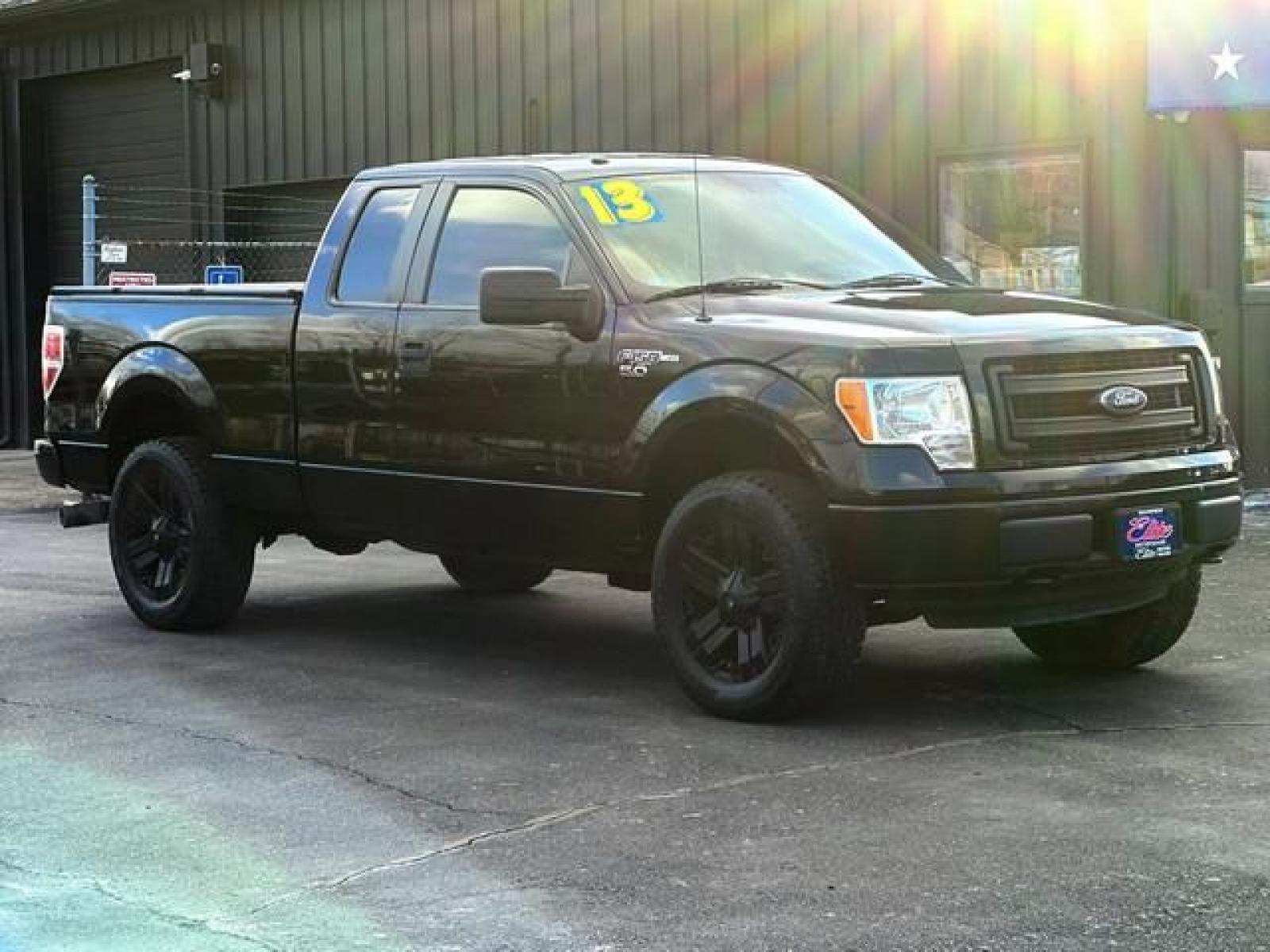 2013 BLACK FORD F-150 (1FTFX1EF7DK) with an V8,5.0L(302 CID),DOHC engine, AUTOMATIC transmission, located at 14600 Frazho Road, Warren, MI, 48089, (586) 776-3400, 42.485996, -82.974220 - Photo #2