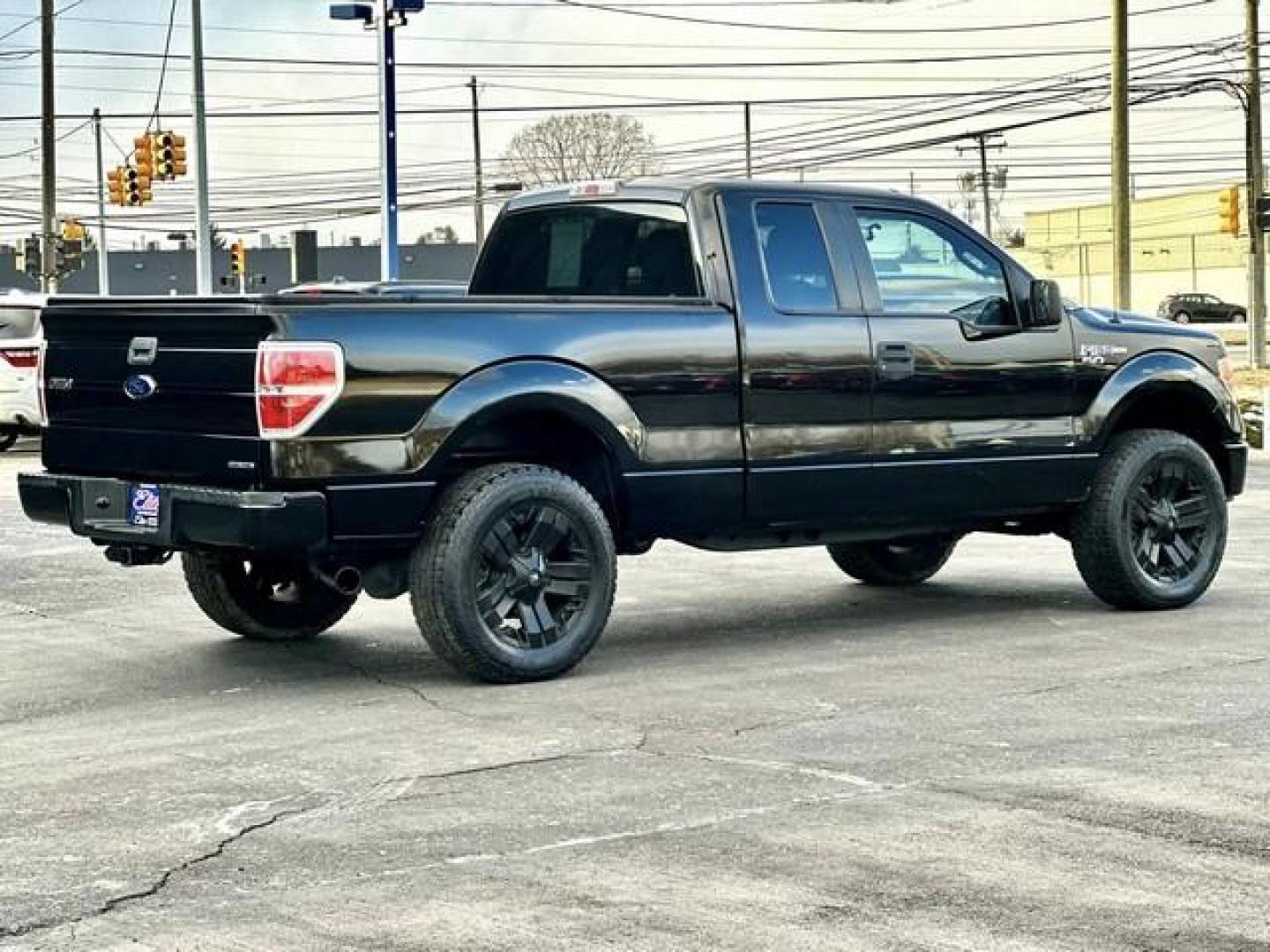 2013 BLACK FORD F-150 (1FTFX1EF7DK) with an V8,5.0L(302 CID),DOHC engine, AUTOMATIC transmission, located at 14600 Frazho Road, Warren, MI, 48089, (586) 776-3400, 42.485996, -82.974220 - Photo#4