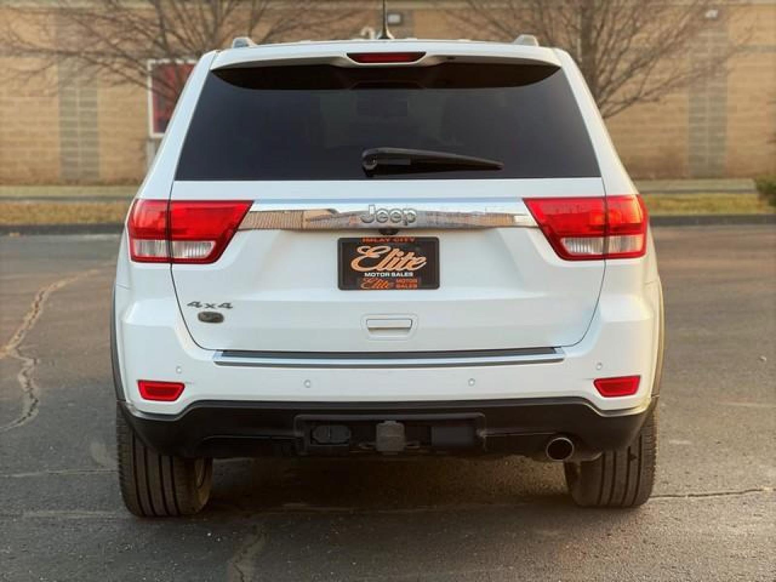 2012 WHITE JEEP GRAND CHEROKEE (1C4RJFCG7CC) with an V6,3.6L(220 CID),DOHC engine, AUTOMATIC transmission, located at 14600 Frazho Road, Warren, MI, 48089, (586) 776-3400, 42.485996, -82.974220 - Photo #6