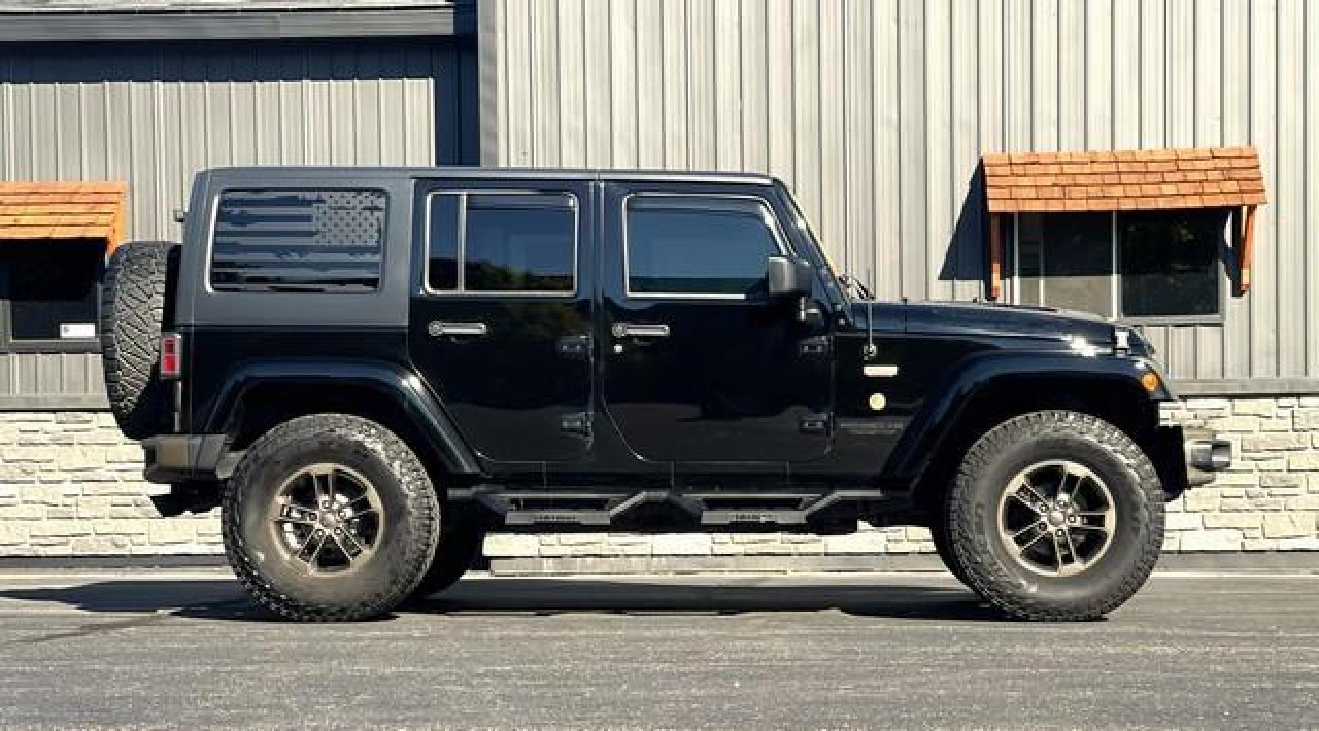 2017 BLACK JEEP WRANGLER (1C4BJWEG0HL) with an V6,3.6L(220 CID),DOHC engine, AUTOMATIC transmission, located at 14600 Frazho Road, Warren, MI, 48089, (586) 776-3400, 42.485996, -82.974220 - Photo#6