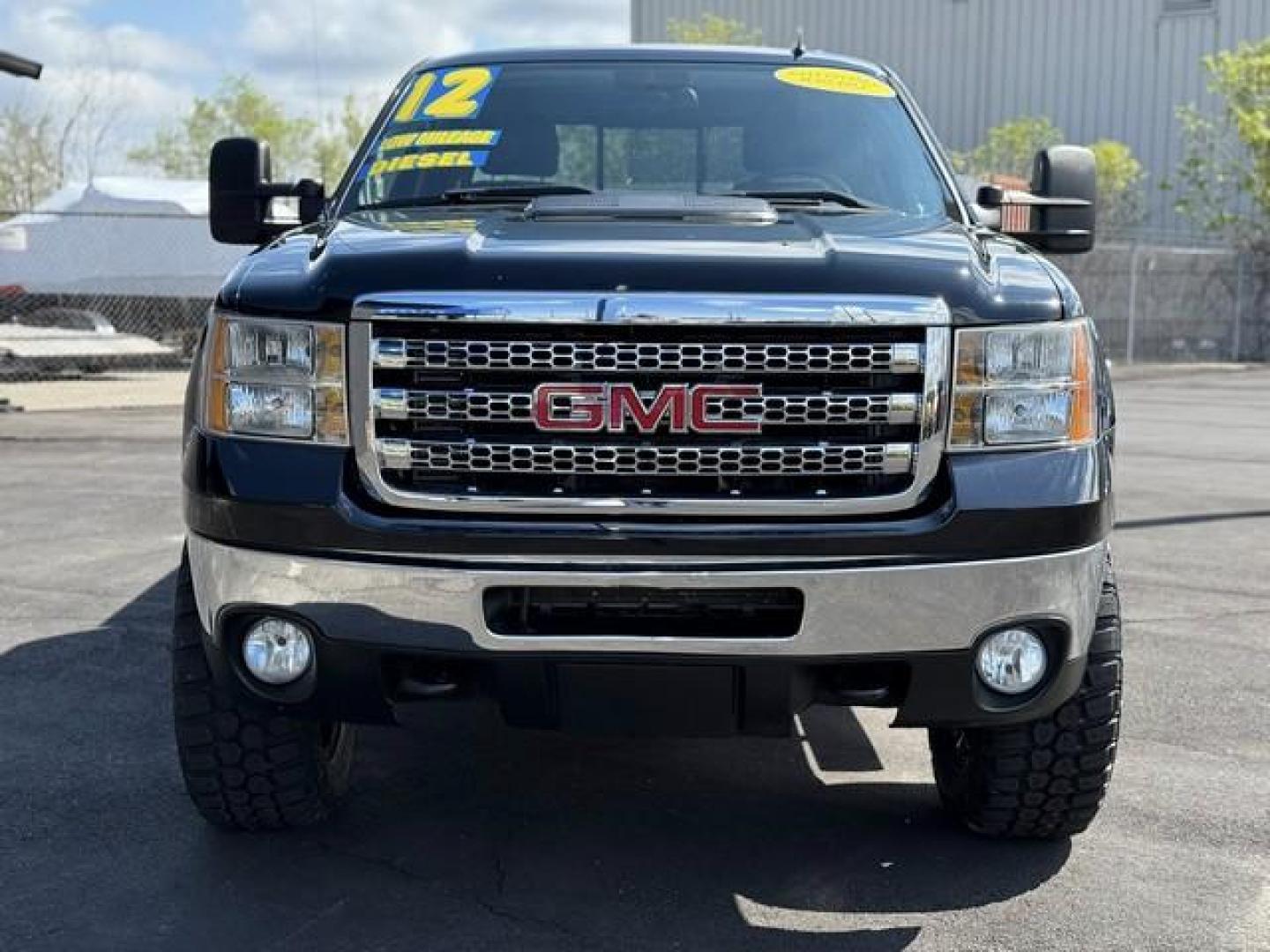 2012 BLACK GMC SIERRA 3500 HD (1GT424C85CF) with an V8,6.6L(403 CID),OHV engine, AUTOMATIC transmission, located at 14600 Frazho Road, Warren, MI, 48089, (586) 776-3400, 42.485996, -82.974220 - Photo#2