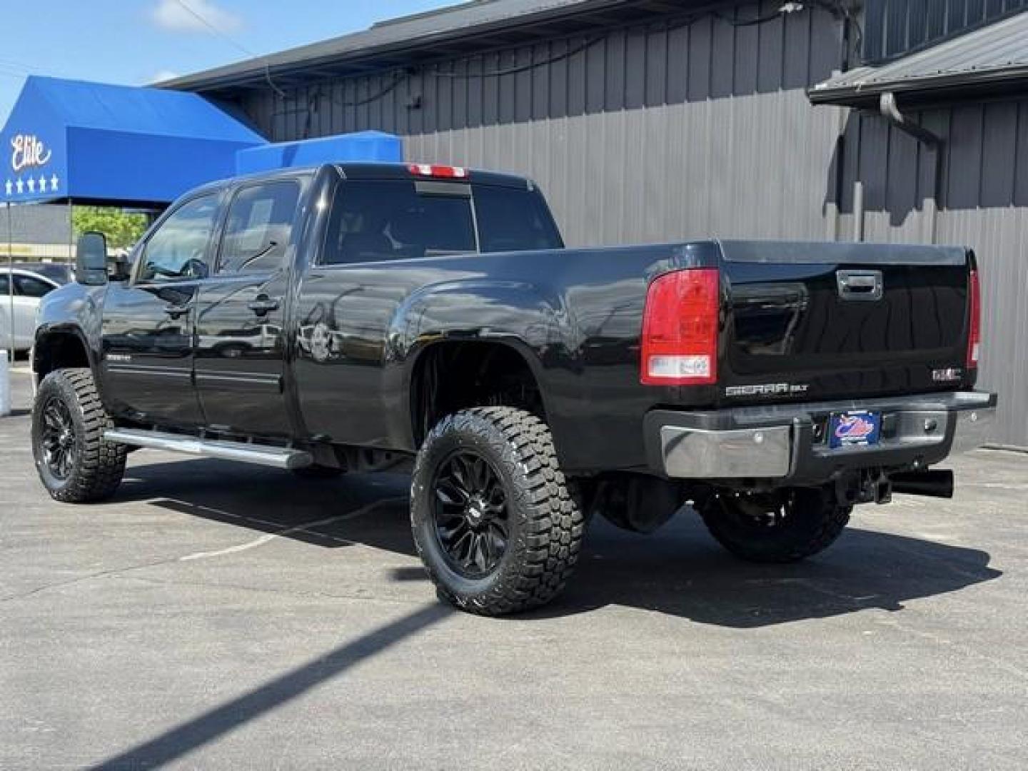 2012 BLACK GMC SIERRA 3500 HD (1GT424C85CF) with an V8,6.6L(403 CID),OHV engine, AUTOMATIC transmission, located at 14600 Frazho Road, Warren, MI, 48089, (586) 776-3400, 42.485996, -82.974220 - Photo#6