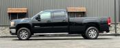 2012 BLACK GMC SIERRA 3500 HD (1GT424C85CF) with an V8,6.6L(403 CID),OHV engine, AUTOMATIC transmission, located at 14600 Frazho Road, Warren, MI, 48089, (586) 776-3400, 42.485996, -82.974220 - Photo#1