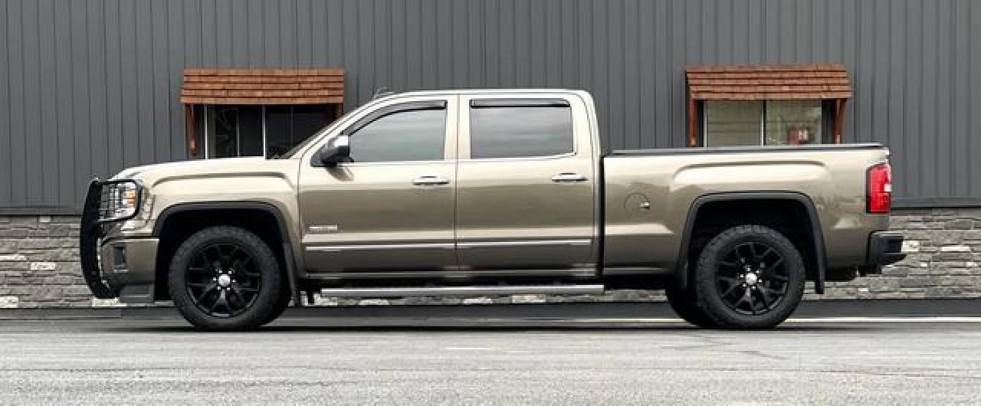 2015 BROWN GMC SIERRA 1500 (3GTU2UEC0FG) with an V8,5.3L(325 CID),OHV engine, AUTOMATIC transmission, located at 14600 Frazho Road, Warren, MI, 48089, (586) 776-3400, 42.485996, -82.974220 - Photo#1