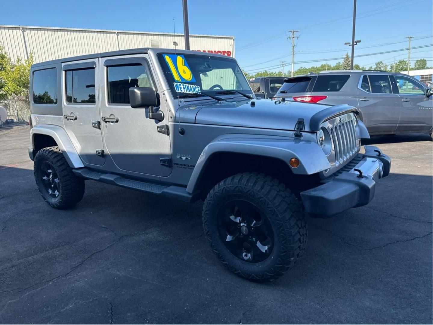 2016 SILVER JEEP WRANGLER (1C4BJWEG1GL) with an V6,3.6L(220 CID),DOHC engine, AUTOMATIC transmission, located at 14600 Frazho Road, Warren, MI, 48089, (586) 776-3400, 42.485996, -82.974220 - Photo#2