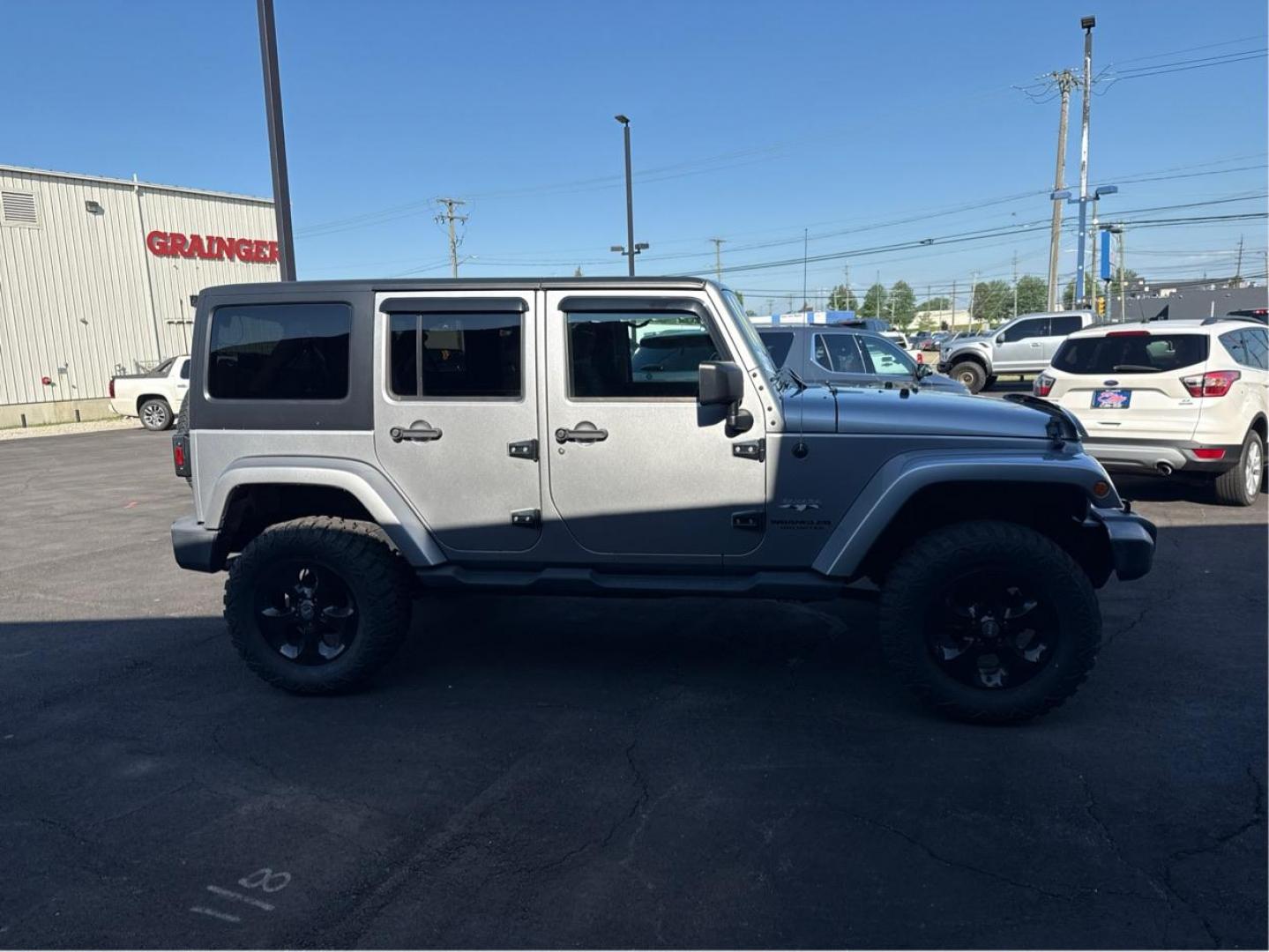 2016 SILVER JEEP WRANGLER (1C4BJWEG1GL) with an V6,3.6L(220 CID),DOHC engine, AUTOMATIC transmission, located at 14600 Frazho Road, Warren, MI, 48089, (586) 776-3400, 42.485996, -82.974220 - Photo#3