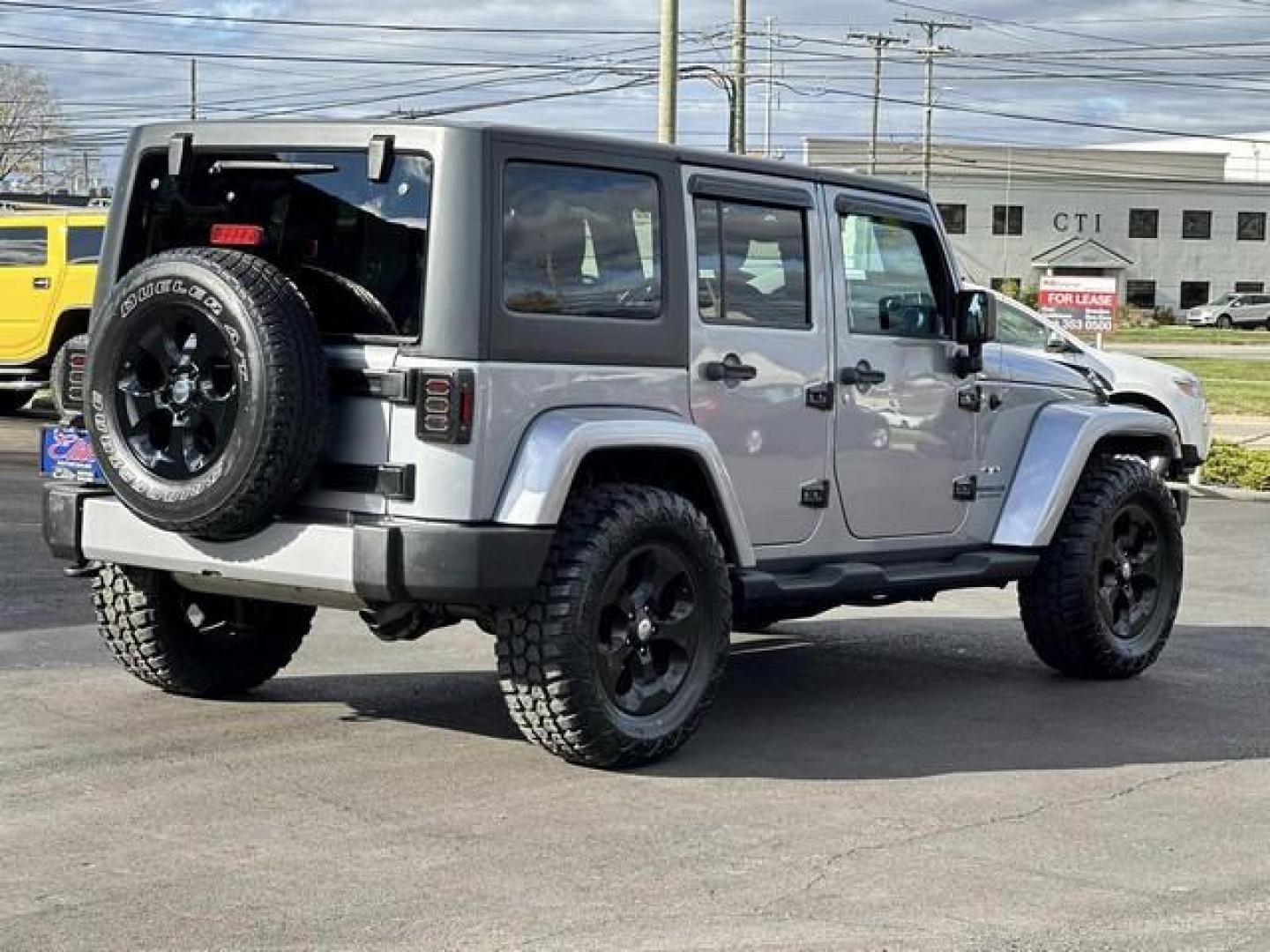 2016 SILVER JEEP WRANGLER (1C4BJWEG1GL) with an V6,3.6L(220 CID),DOHC engine, AUTOMATIC transmission, located at 14600 Frazho Road, Warren, MI, 48089, (586) 776-3400, 42.485996, -82.974220 - Photo#6