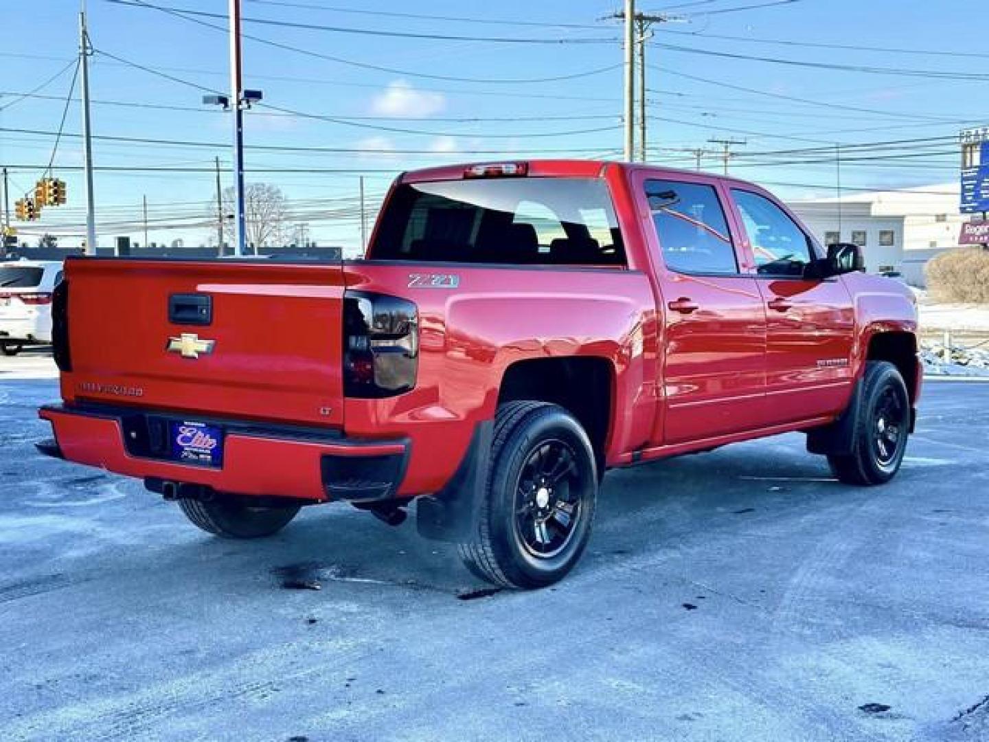 2017 RED CHEVROLET SILVERADO 1500 (3GCUKREC9HG) with an V8,5.3L(325 CID),OHV engine, AUTOMATIC transmission, located at 14600 Frazho Road, Warren, MI, 48089, (586) 776-3400, 42.485996, -82.974220 - Photo#4