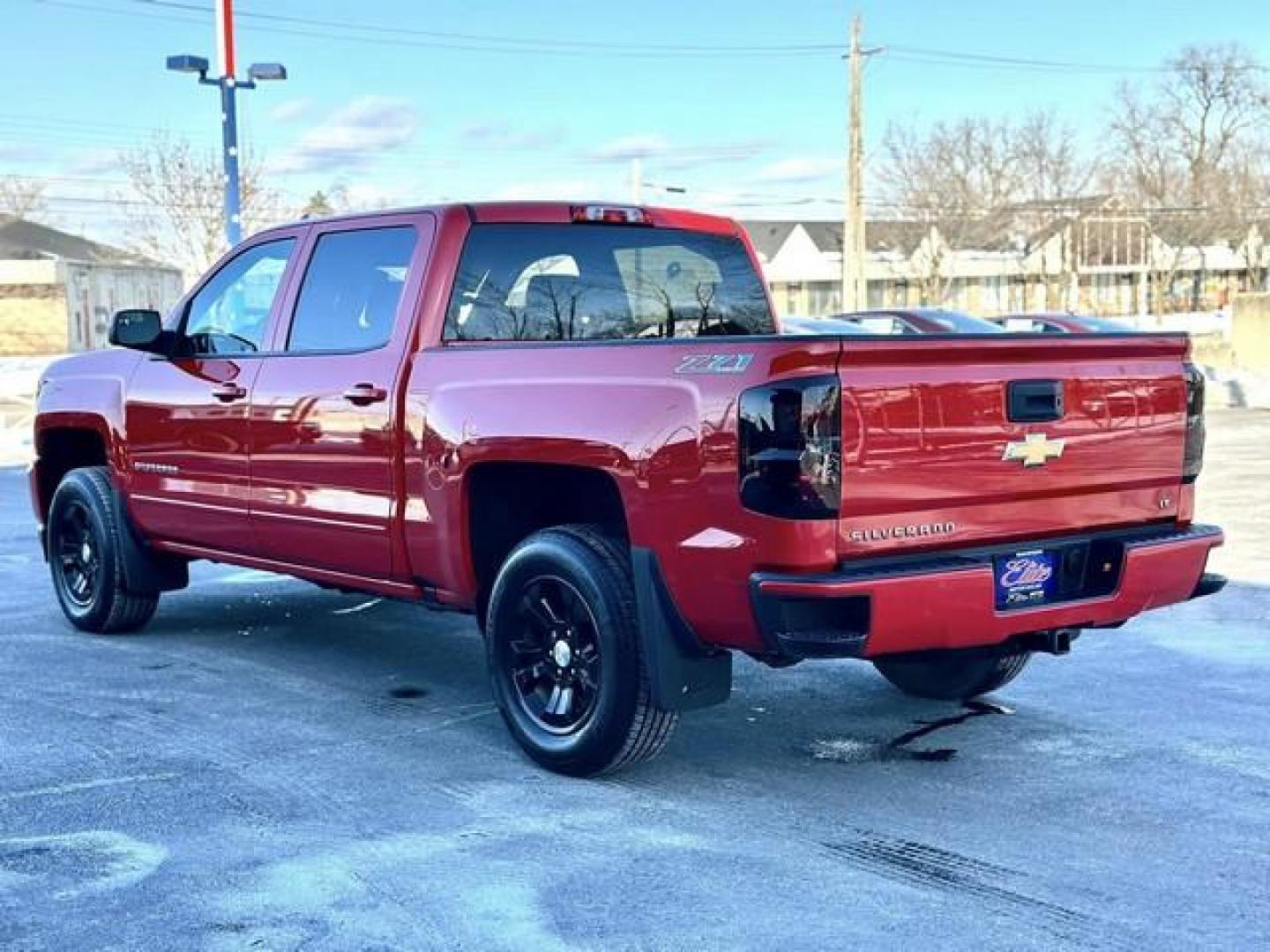 2017 RED CHEVROLET SILVERADO 1500 (3GCUKREC9HG) with an V8,5.3L(325 CID),OHV engine, AUTOMATIC transmission, located at 14600 Frazho Road, Warren, MI, 48089, (586) 776-3400, 42.485996, -82.974220 - Photo#5