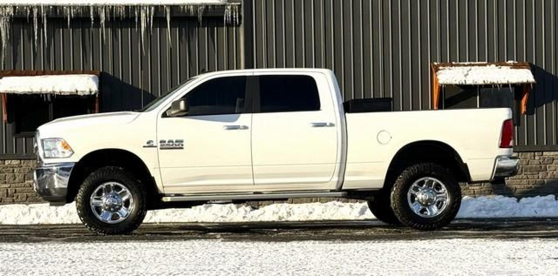 2017 WHITE RAM 2500 (3C6UR5DL9HG) with an L6,6.7L(408 CID),OHV engine, AUTOMATIC transmission, located at 14600 Frazho Road, Warren, MI, 48089, (586) 776-3400, 42.485996, -82.974220 - Photo#1
