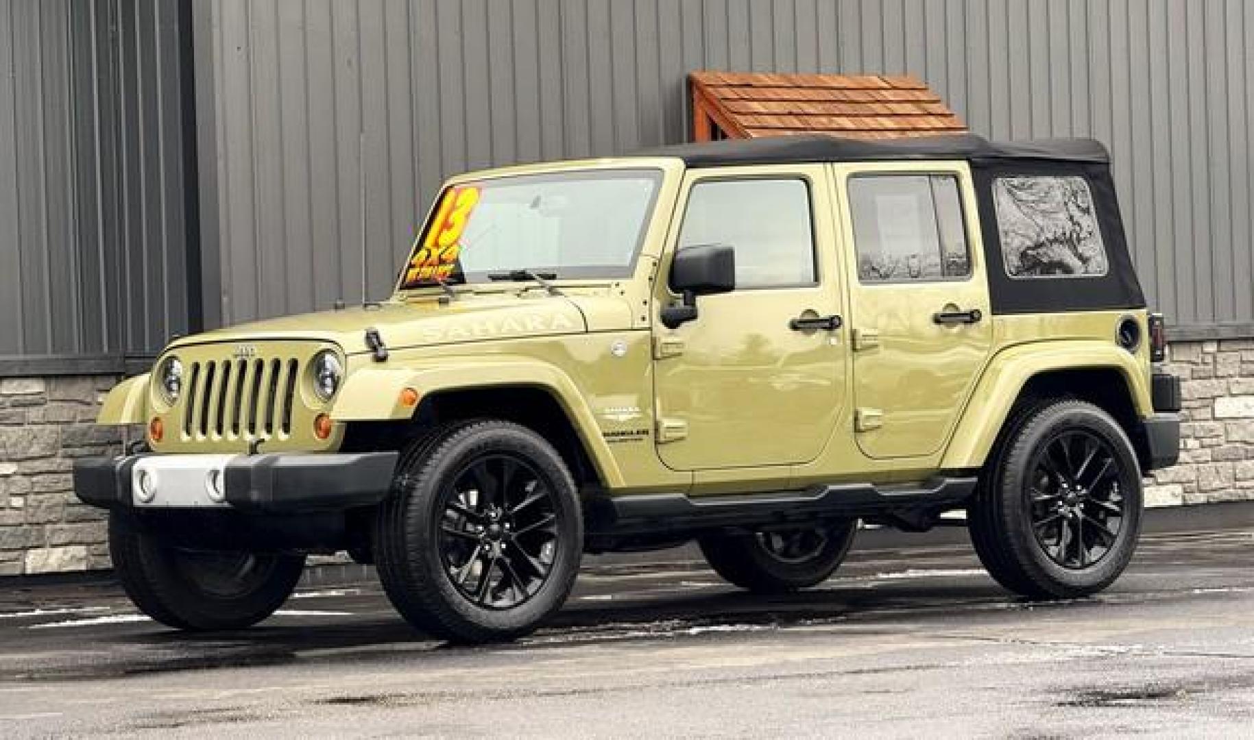 2013 GREEN JEEP WRANGLER (1C4BJWEG9DL) with an V6,3.6L(220 CID),DOHC engine, AUTOMATIC transmission, located at 14600 Frazho Road, Warren, MI, 48089, (586) 776-3400, 42.485996, -82.974220 - Photo#1
