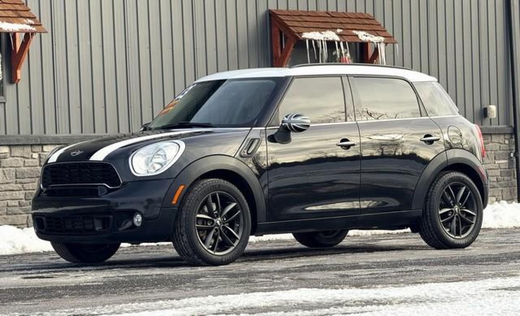 2013 BLACK MINI COOPER COUNTRYMAN (WMWZC3C53DW) with an L4,1.6L(98 CID),DOHC engine, AUTOMATIC transmission, located at 14600 Frazho Road, Warren, MI, 48089, (586) 776-3400, 42.485996, -82.974220 - Photo#1