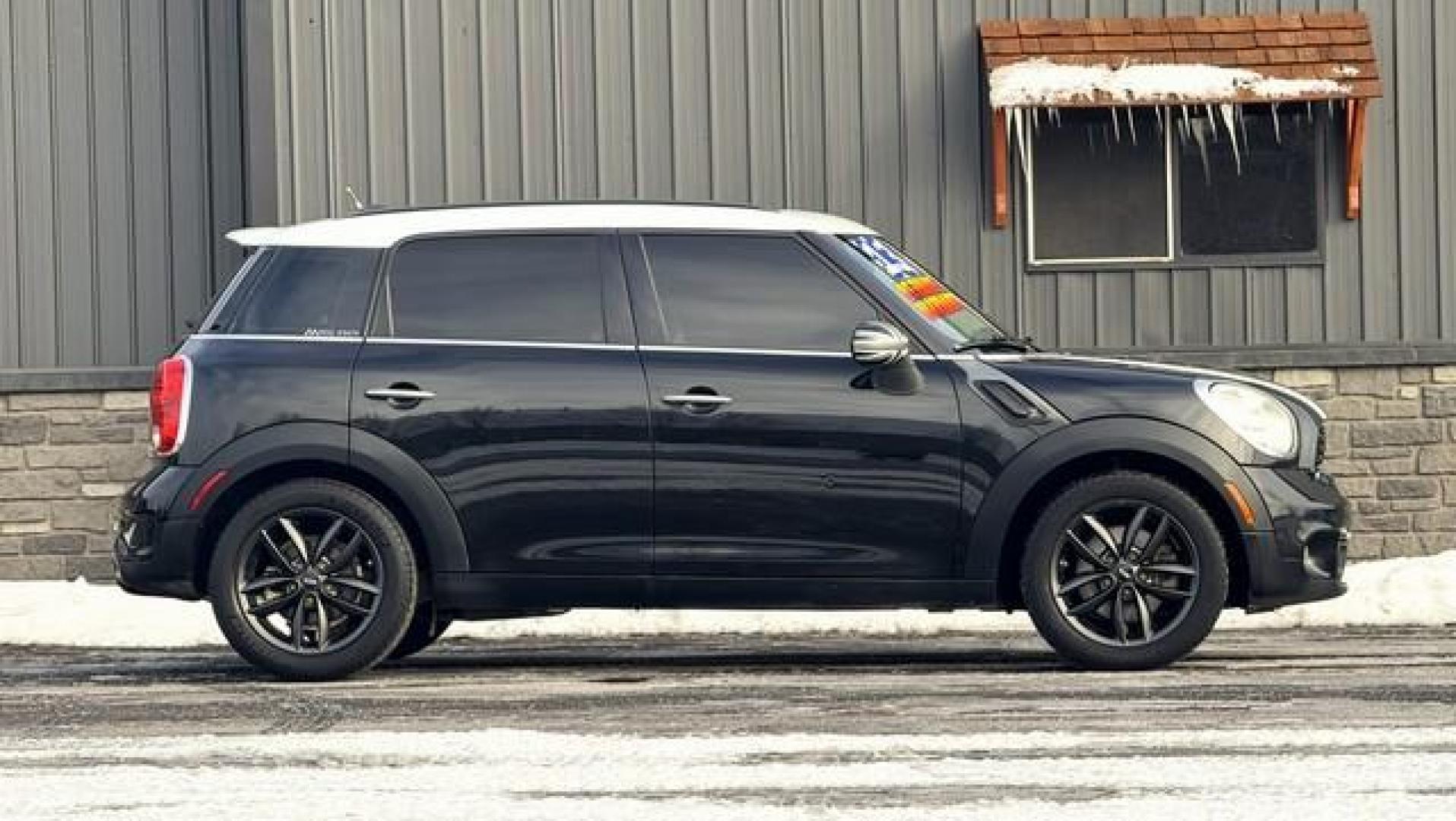 2013 BLACK MINI COOPER COUNTRYMAN (WMWZC3C53DW) with an L4,1.6L(98 CID),DOHC engine, AUTOMATIC transmission, located at 14600 Frazho Road, Warren, MI, 48089, (586) 776-3400, 42.485996, -82.974220 - Photo#2