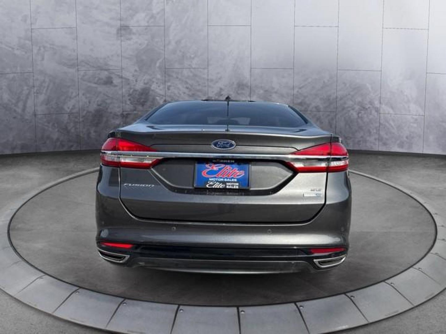 2018 GRAY FORD FUSION (3FA6P0T96JR) with an L4,2.0L(122 CID),DOHC engine, AUTOMATIC transmission, located at 14600 Frazho Road, Warren, MI, 48089, (586) 776-3400, 42.485996, -82.974220 - Photo#5