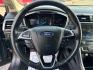 2018 GRAY FORD FUSION (3FA6P0T96JR) with an L4,2.0L(122 CID),DOHC engine, AUTOMATIC transmission, located at 14600 Frazho Road, Warren, MI, 48089, (586) 776-3400, 42.485996, -82.974220 - Photo#16