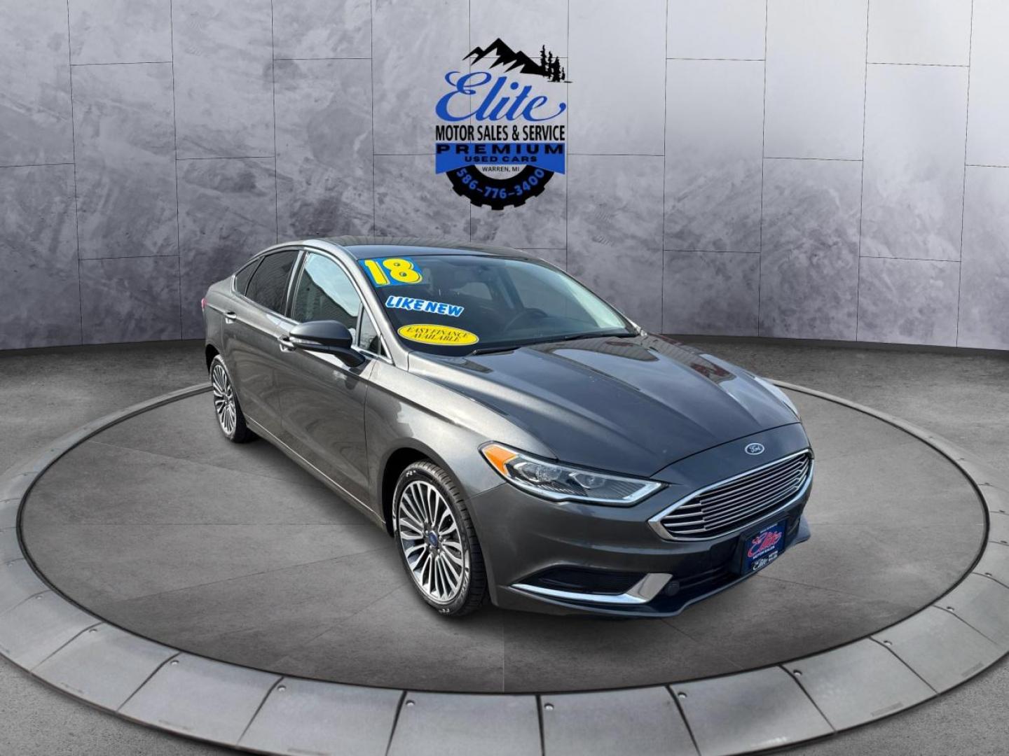2018 GRAY FORD FUSION (3FA6P0T96JR) with an L4,2.0L(122 CID),DOHC engine, AUTOMATIC transmission, located at 14600 Frazho Road, Warren, MI, 48089, (586) 776-3400, 42.485996, -82.974220 - Photo#2
