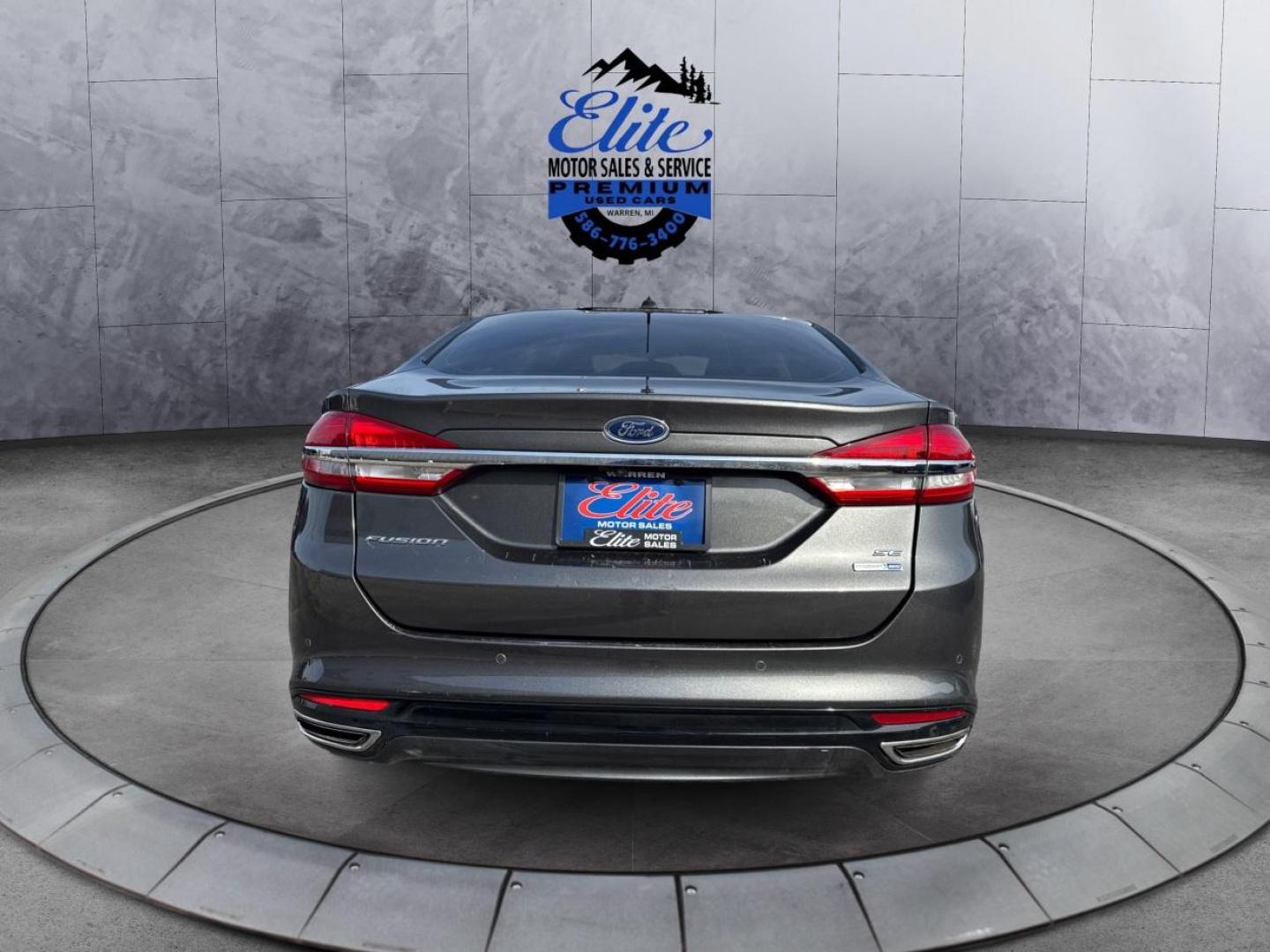 2018 GRAY FORD FUSION (3FA6P0T96JR) with an L4,2.0L(122 CID),DOHC engine, AUTOMATIC transmission, located at 14600 Frazho Road, Warren, MI, 48089, (586) 776-3400, 42.485996, -82.974220 - Photo#5