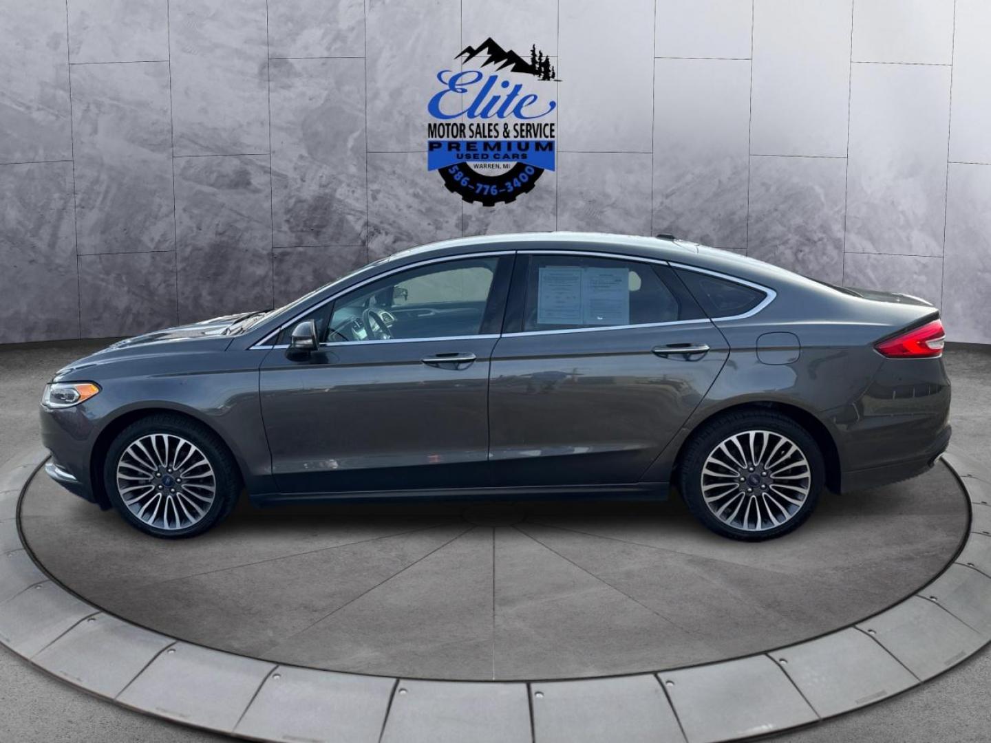 2018 GRAY FORD FUSION (3FA6P0T96JR) with an L4,2.0L(122 CID),DOHC engine, AUTOMATIC transmission, located at 14600 Frazho Road, Warren, MI, 48089, (586) 776-3400, 42.485996, -82.974220 - Photo#7