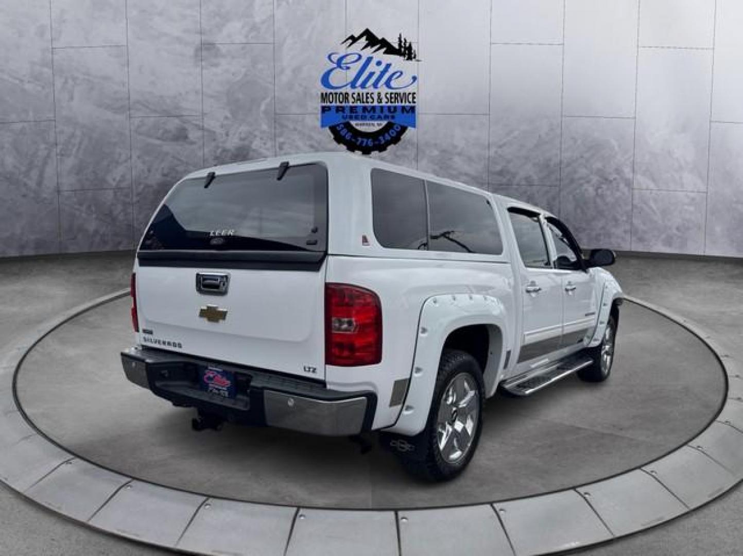 2011 WHITE CHEVROLET SILVERADO 1500 (3GCPKTE3XBG) with an V8,5.3L(325 CID),OHV engine, AUTOMATIC transmission, located at 14600 Frazho Road, Warren, MI, 48089, (586) 776-3400, 42.485996, -82.974220 - Photo#4