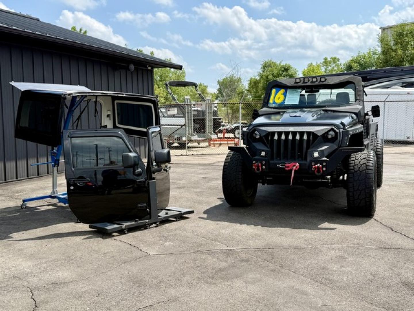 2016 BLACK JEEP WRANGLER (1C4AJWBG1GL) with an V6,3.6L(220 CID),DOHC engine, AUTOMATIC transmission, located at 14600 Frazho Road, Warren, MI, 48089, (586) 776-3400, 42.485996, -82.974220- Photo#1