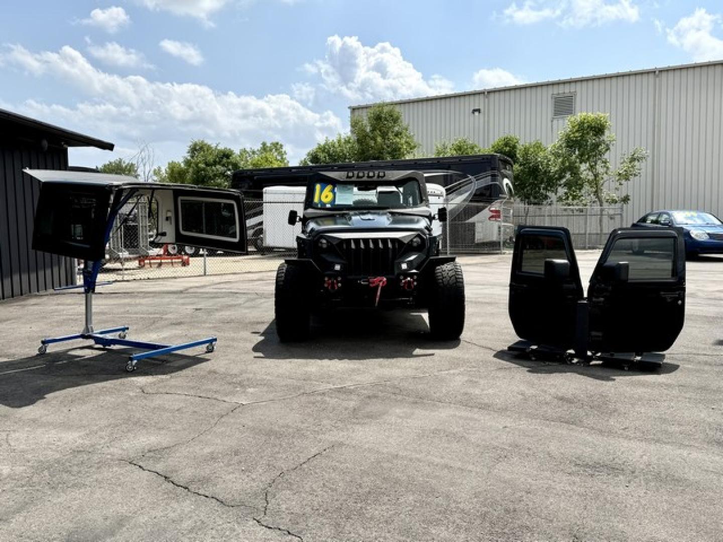 2016 BLACK JEEP WRANGLER (1C4AJWBG1GL) with an V6,3.6L(220 CID),DOHC engine, AUTOMATIC transmission, located at 14600 Frazho Road, Warren, MI, 48089, (586) 776-3400, 42.485996, -82.974220- Photo#3