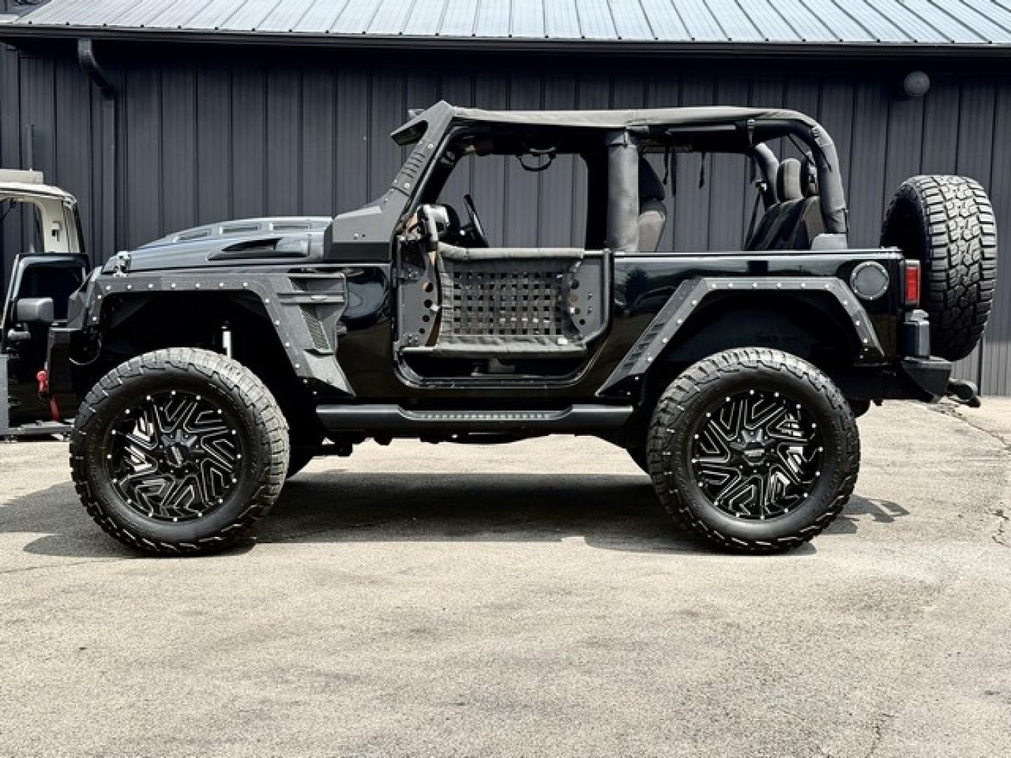 2016 BLACK JEEP WRANGLER (1C4AJWBG1GL) with an V6,3.6L(220 CID),DOHC engine, AUTOMATIC transmission, located at 14600 Frazho Road, Warren, MI, 48089, (586) 776-3400, 42.485996, -82.974220- Photo#6