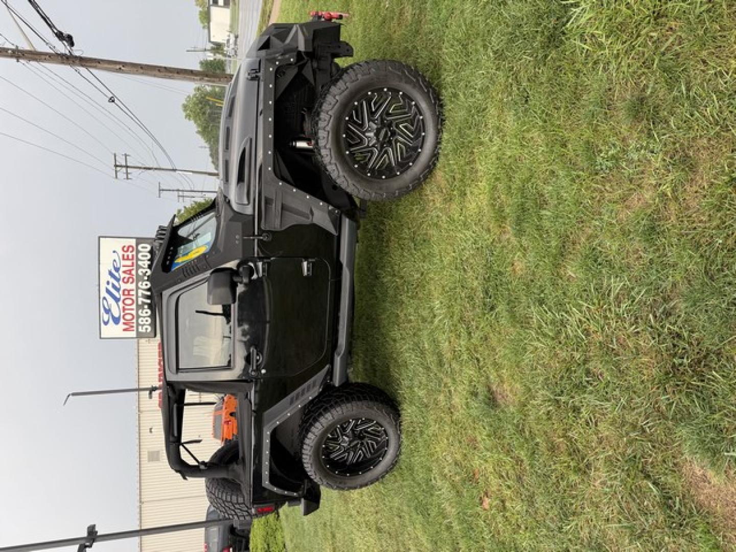 2016 BLACK JEEP WRANGLER (1C4AJWBG1GL) with an V6,3.6L(220 CID),DOHC engine, AUTOMATIC transmission, located at 14600 Frazho Road, Warren, MI, 48089, (586) 776-3400, 42.485996, -82.974220- Photo#17