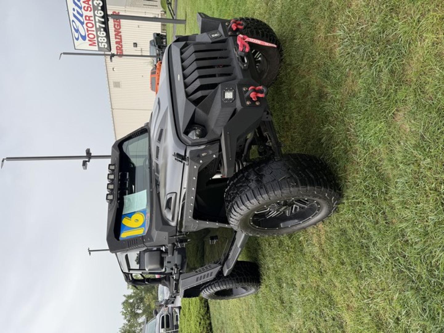 2016 BLACK JEEP WRANGLER (1C4AJWBG1GL) with an V6,3.6L(220 CID),DOHC engine, AUTOMATIC transmission, located at 14600 Frazho Road, Warren, MI, 48089, (586) 776-3400, 42.485996, -82.974220- Photo#18