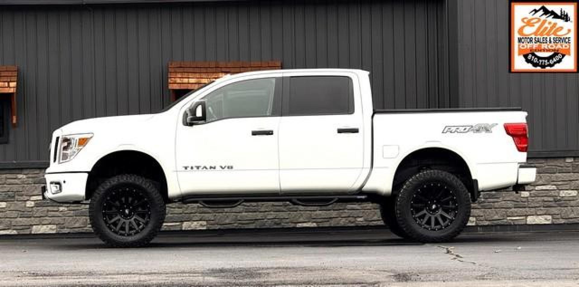 2018 WHITE NISSAN TITAN (1N6AA1E5XJN) with an V8,5.6L( CID),DOHC engine, AUTOMATIC transmission, located at 14600 Frazho Road, Warren, MI, 48089, (586) 776-3400, 42.485996, -82.974220 - Photo#0