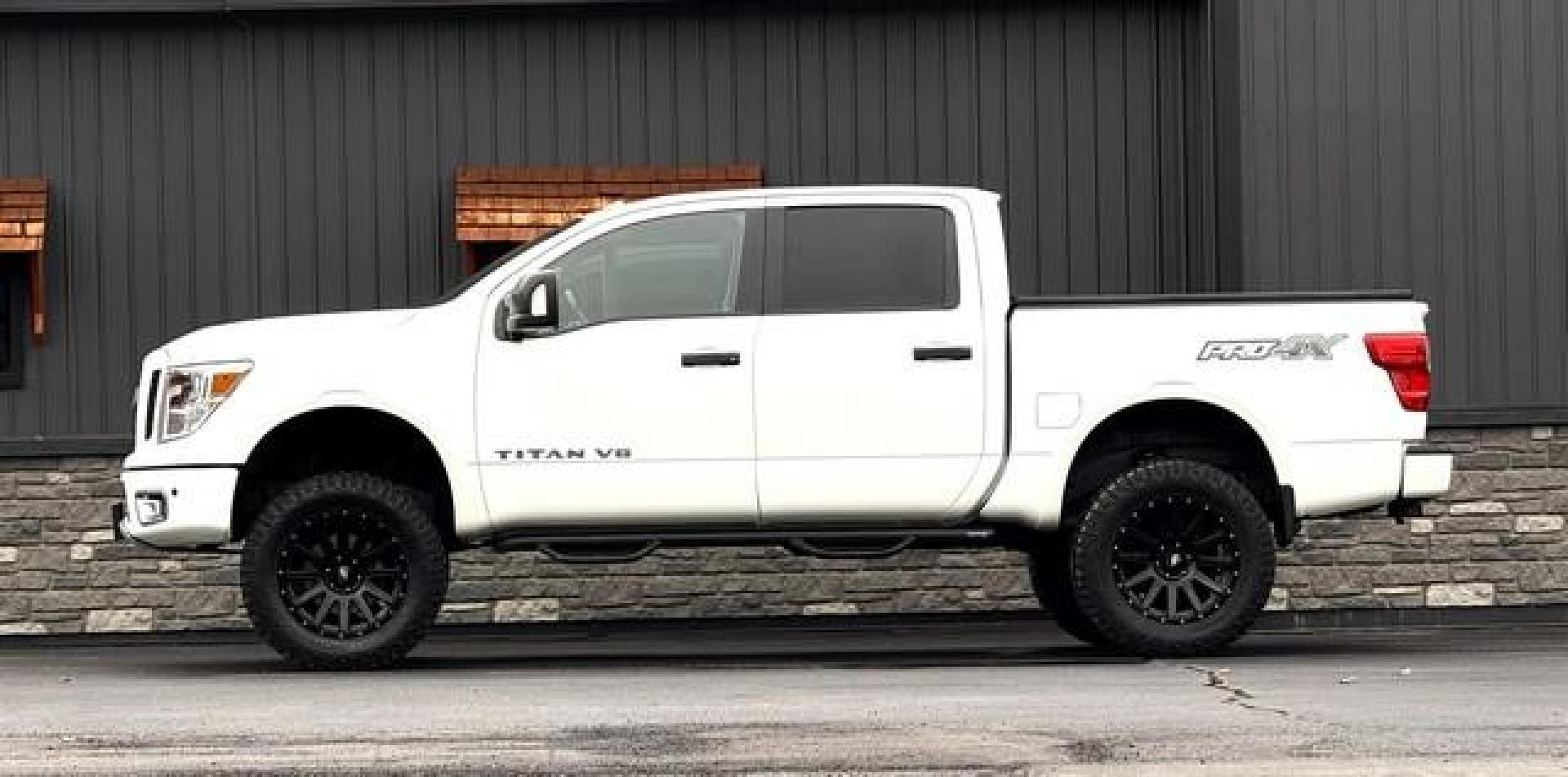 2018 WHITE NISSAN TITAN (1N6AA1E5XJN) with an V8,5.6L( CID),DOHC engine, AUTOMATIC transmission, located at 14600 Frazho Road, Warren, MI, 48089, (586) 776-3400, 42.485996, -82.974220 - Photo#4