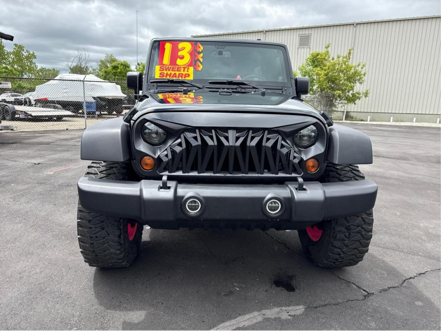 2013 BLACK JEEP WRANGLER (1C4BJWDG7DL) with an V6,3.6L(220 CID),DOHC engine, AUTOMATIC transmission, located at 14600 Frazho Road, Warren, MI, 48089, (586) 776-3400, 42.485996, -82.974220 - Photo#1