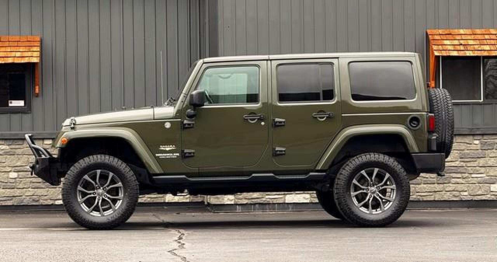 2015 GREEN JEEP WRANGLER (1C4BJWEG4FL) with an V6,3.6L(220 CID),DOHC engine, AUTOMATIC transmission, located at 14600 Frazho Road, Warren, MI, 48089, (586) 776-3400, 42.485996, -82.974220 - Photo#0