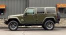 2015 GREEN JEEP WRANGLER (1C4BJWEG4FL) with an V6,3.6L(220 CID),DOHC engine, AUTOMATIC transmission, located at 14600 Frazho Road, Warren, MI, 48089, (586) 776-3400, 42.485996, -82.974220 - Photo#0