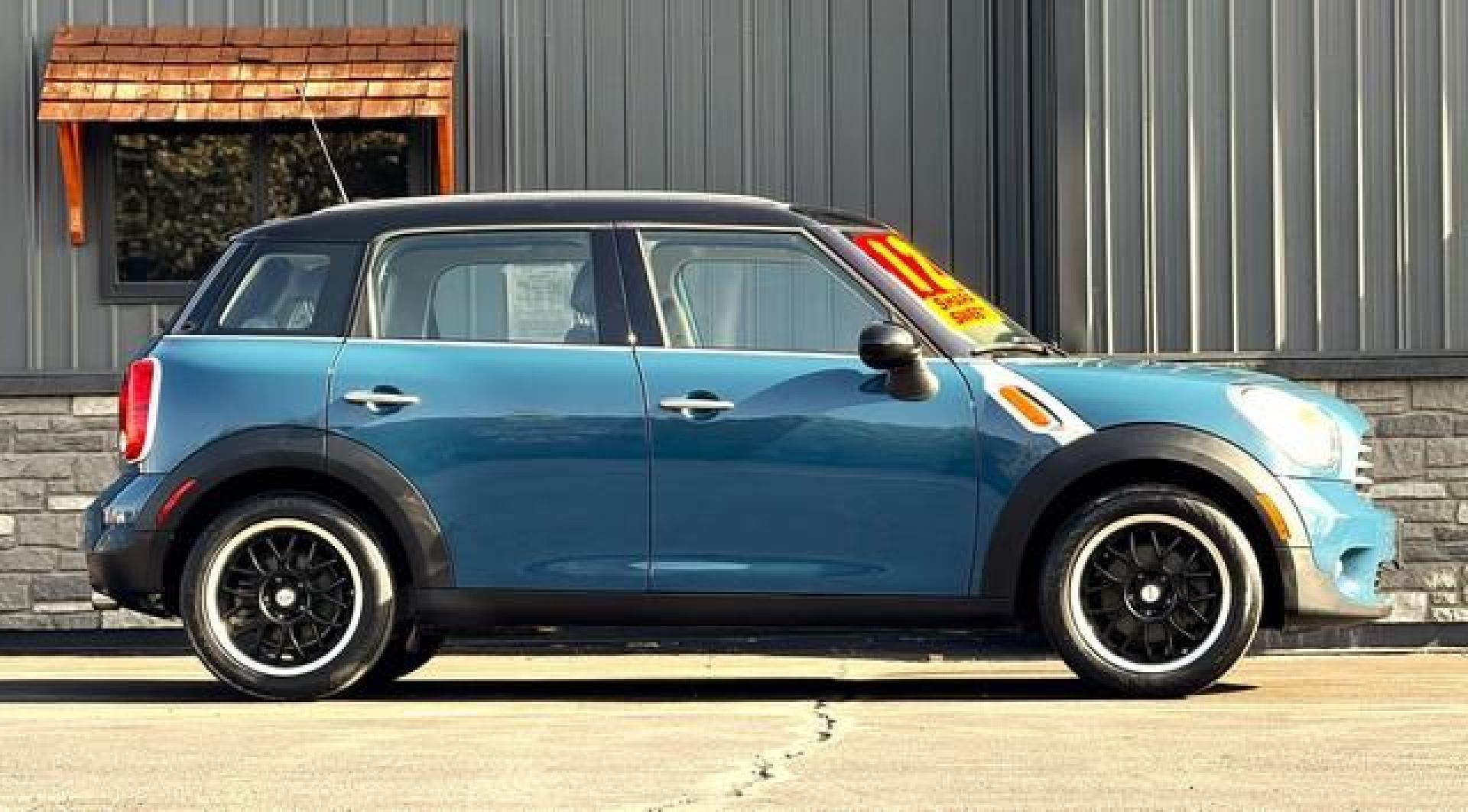 2012 BLUE MINI COOPER COUNTRYMAN (WMWZB3C54CW) with an L4,1.6L(98 CID),DOHC engine, AUTOMATIC transmission, located at 14600 Frazho Road, Warren, MI, 48089, (586) 776-3400, 42.485996, -82.974220 - Photo#1